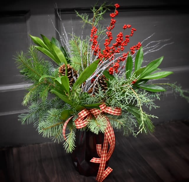 Countryside Christmas - Available for Local St. Cloud, MN Delivery Only - A stroll through the countryside during Christmastime! Festive Christmas greens and winterberry in a tall red rouge vase.