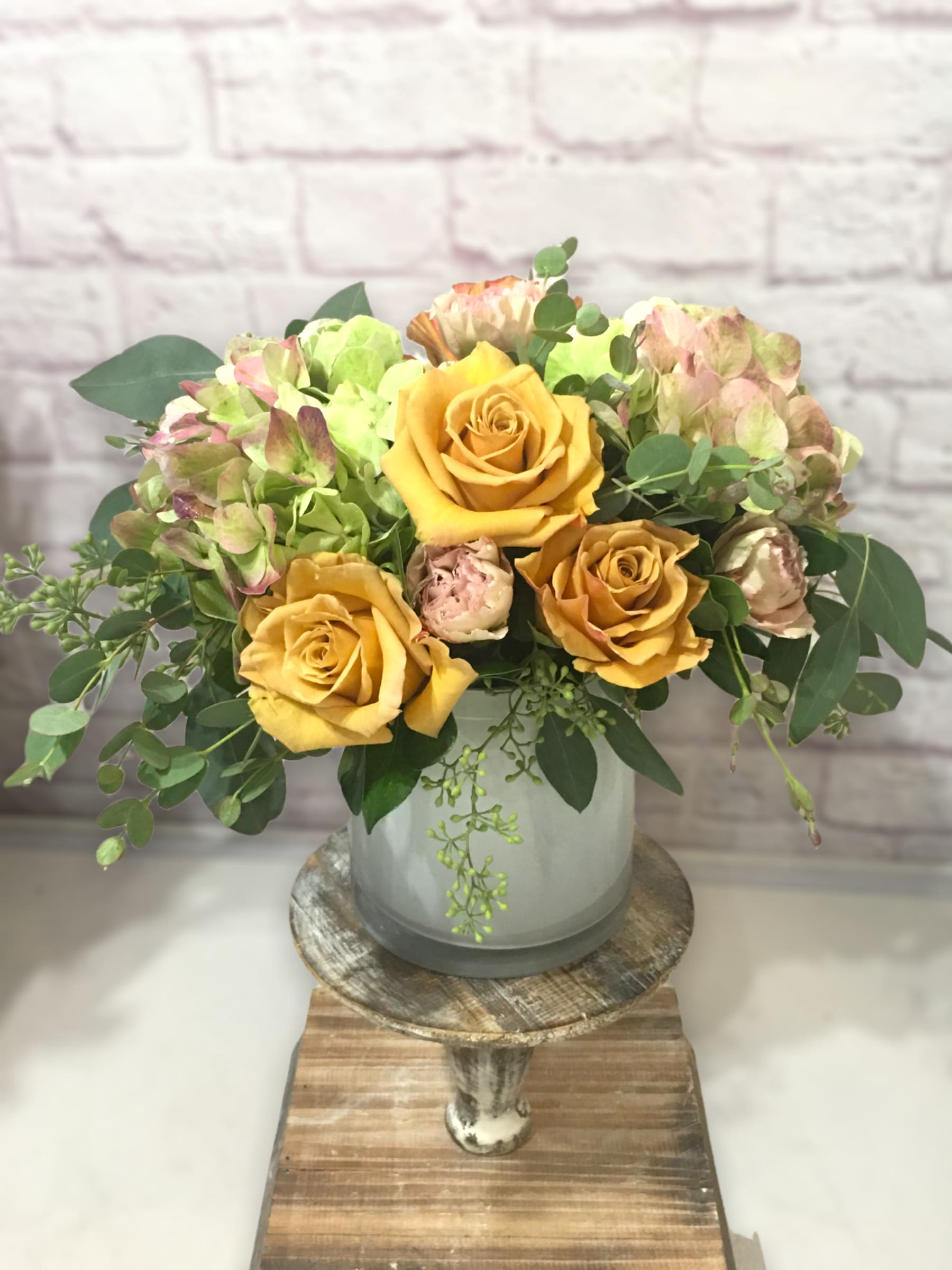 Golden Raspberry Roses - Elegant, classy, subdued. A stunningly beautiful and chic flower bouquet of luxurious golden mustard roses and Santiago speckled hydrangeas skillfully arranged in a pavé in a quality vase. Available for a Limited Time.   Perfect flowers for birthdays, &quot;get well soon,&quot; new baby, sympathy, congratulations, romantic gestures, and &quot;Thank you.&quot; Also a beautiful wedding palette.  Available for delivery in Seattle, Bellevue, Shoreline, and surrounding areas. Available for delivery in all neighborhoods in Seattle including Magnolia, Ballard, Fremont, Downtown, Queen Anne, Crown Hill, U District, West Seattle, International District, Capitol Hill, Pioneer Square, Beacon Hill, Columbia City, Georgetown, etc. 