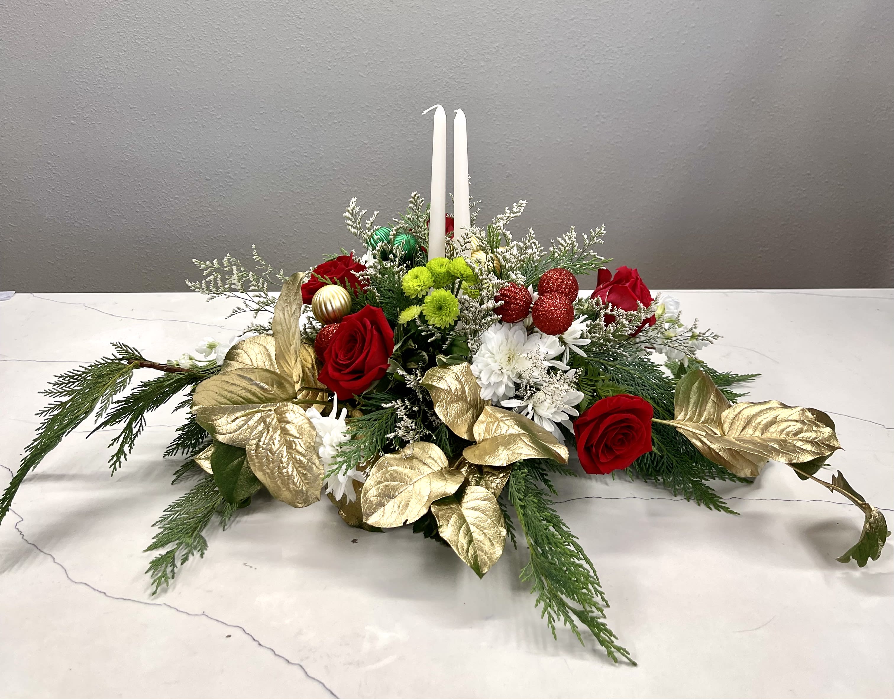Perfect wreath - This beautiful wreath with festive red and white roses ,mums and shiny ornaments is the perfect way to celebrate the holidays with friends and family.