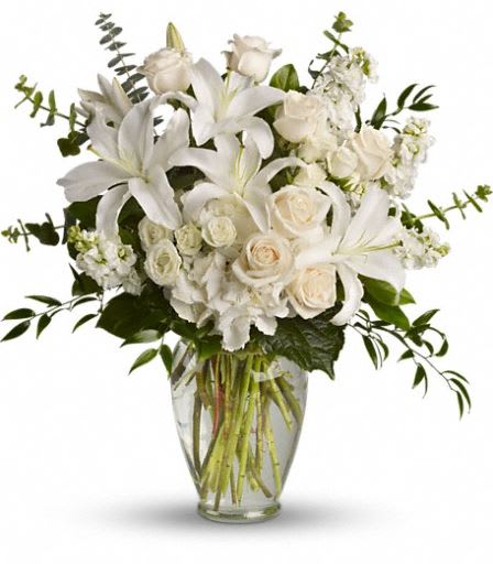T208-1B Dreams From the Heart Bouquet DX - A lovely bouquet to soothe and comfort, a variety of white and peach blossoms sends your hope and strength. Beautifully. Beautiful flowers such as white hydrangea, spray roses and stock, peach roses, eucalyptus and more fill a tall glass vase. Approximately 25&quot; W x 25&quot; H 