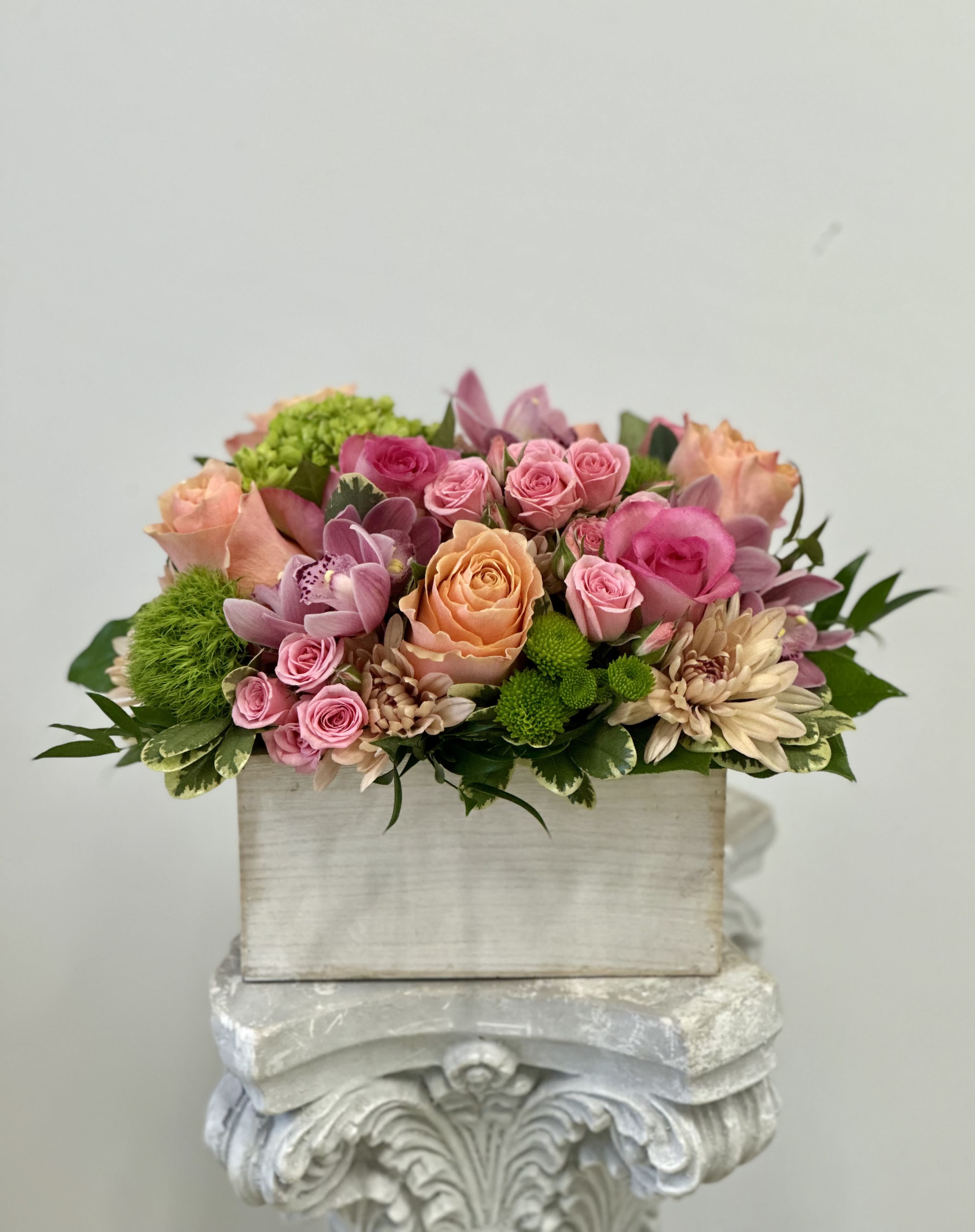 Cheerful by Westford Florist Art by Veny - Brighten up the day with our Cheerful flower arrangement from Westford Florist Art by Veny! Bursting with vibrant colors and lovingly crafted, this delightful bouquet is like a little piece of sunshine sent to brighten anyone's day. Whether it’s for celebrating birthdays, anniversaries, or simply to spread some joy, these blooms are perfect for every occasion. Each arrangement is made with passion and care, ensuring that beauty and happiness flow into your life effortlessly. Treat yourself or surprise someone special – because who doesn't need a bit of cheer? 