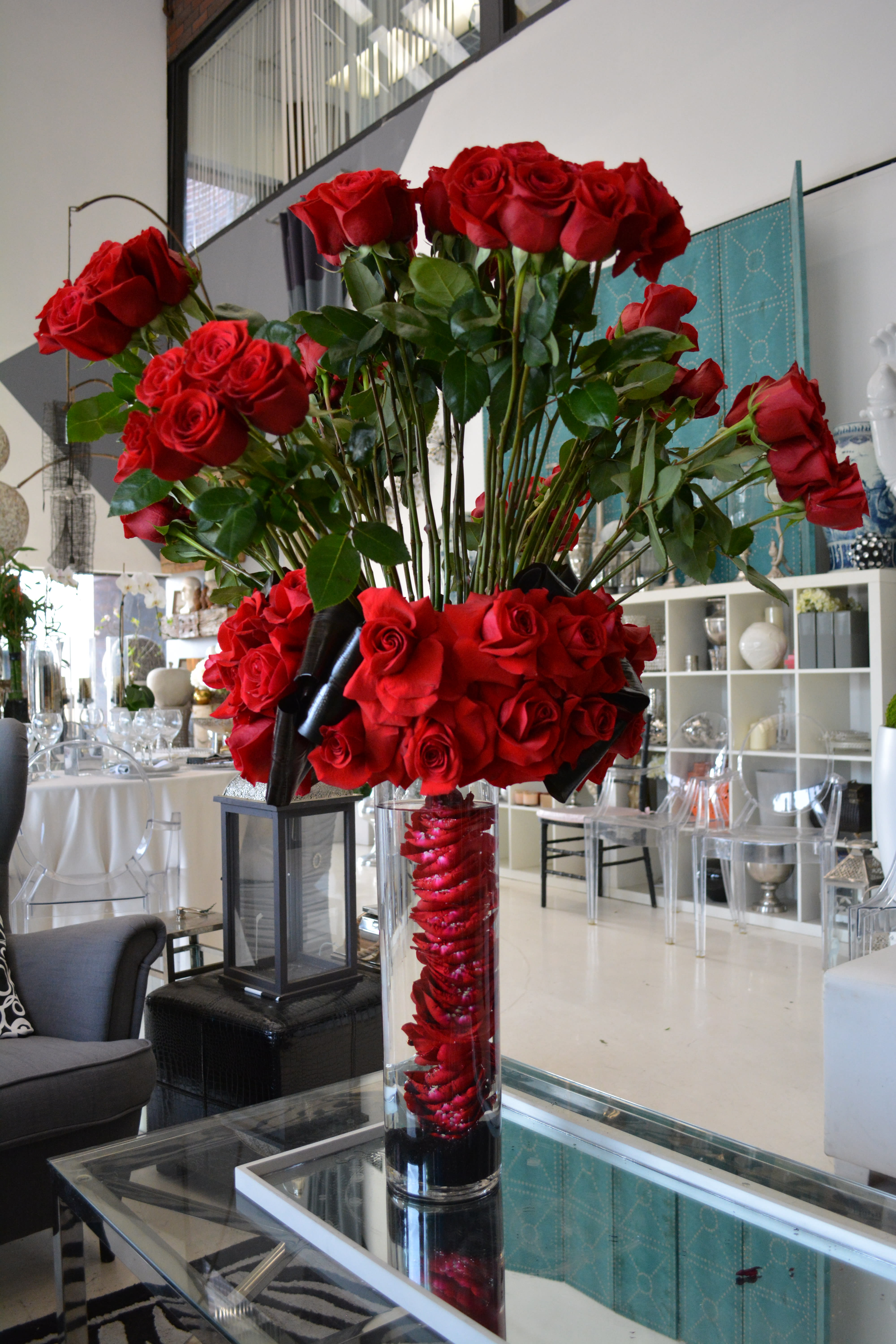 Love On Fire - Grand Red Rose Arrangement with Submerged Red Roses in Cylinder Vase.    Approx 3ft tall