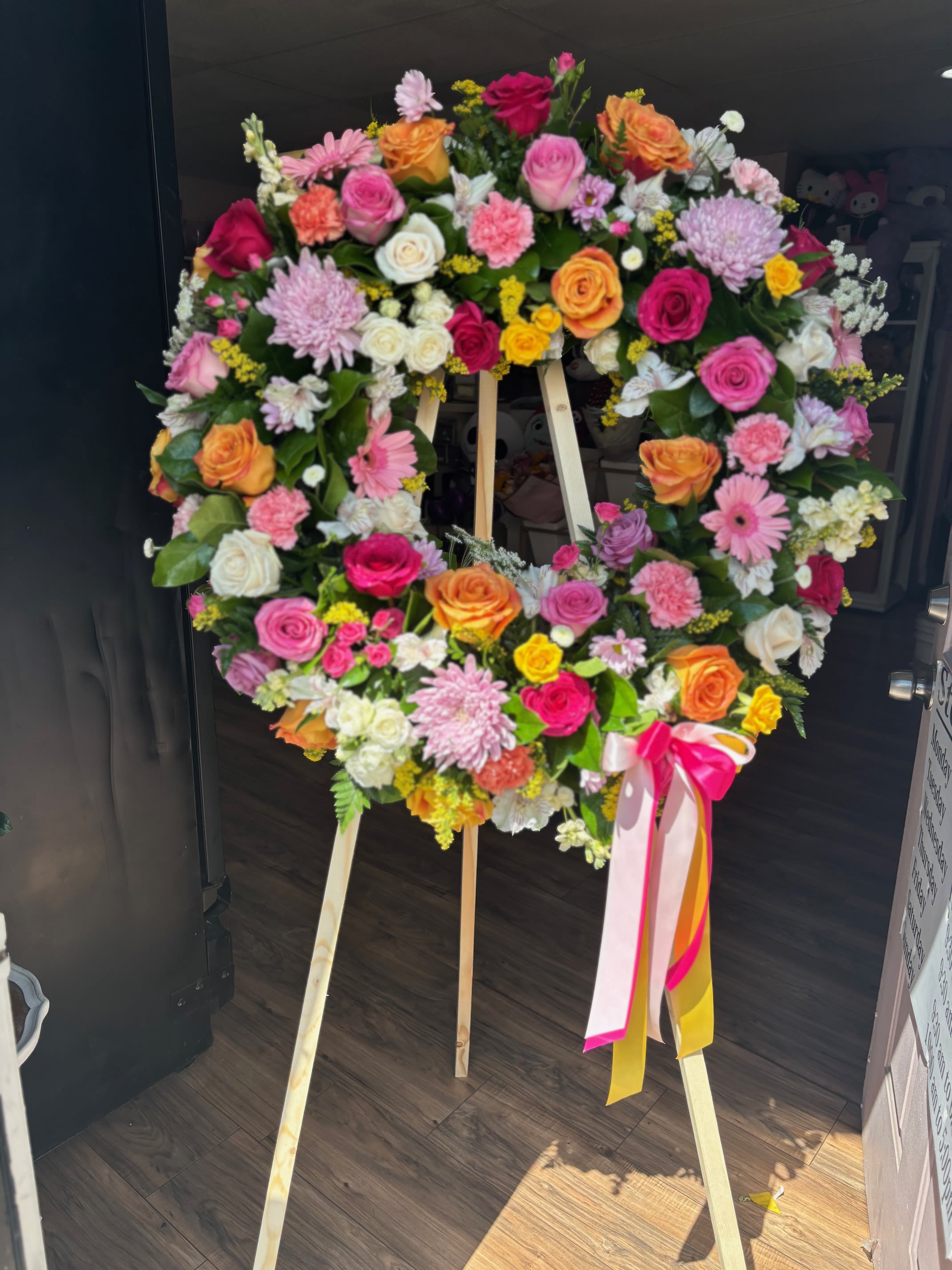 Loving Rememberance Sympathy Wreath - Share a gesture of love and support with the Loving Remembrance Wreath, a respectful display of Mixed Florals to communicate your condolences.