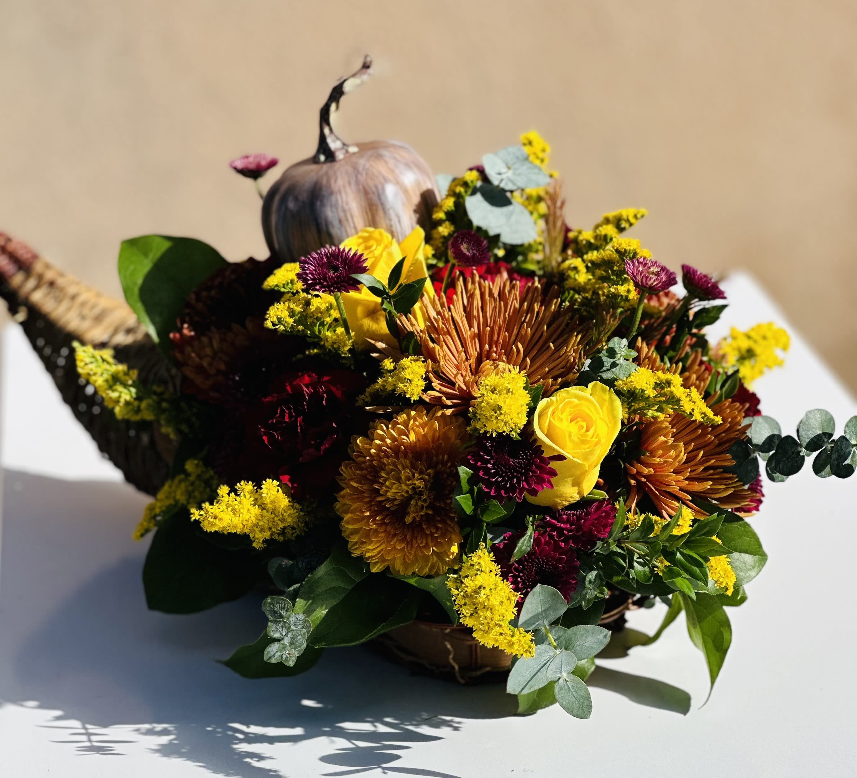 Fall Cornucopia by Grohe Florists - Enjoy your gathering with a unique twist.