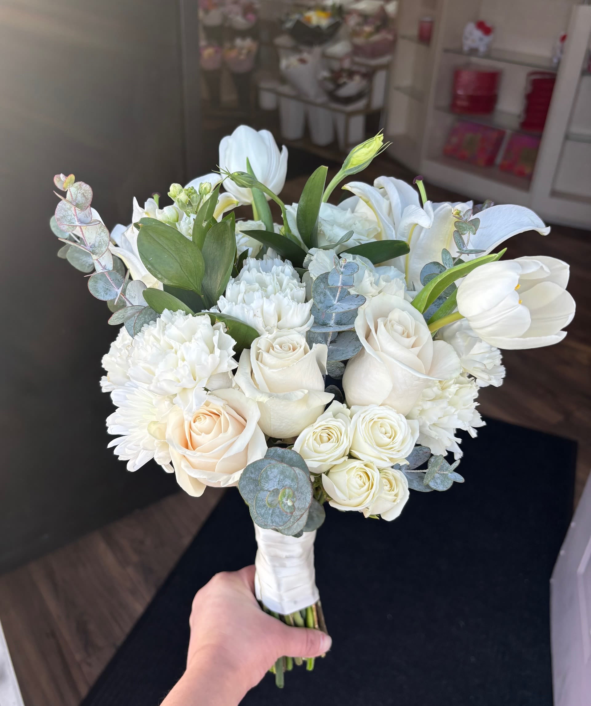 Simple Timeless Bridal Bouquet - This is a simple Timeless Bridal Bouquet with out breaking the bank, A mixtures of White Floral.