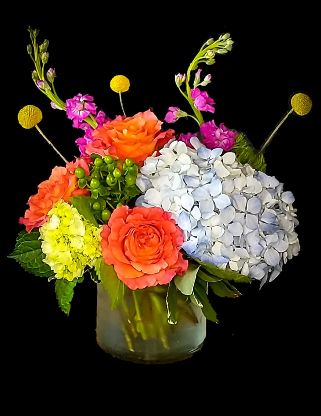 Life of the Party! - All of the fun in one vase!  This mix of bright colors and flowers is sure to please everyone!