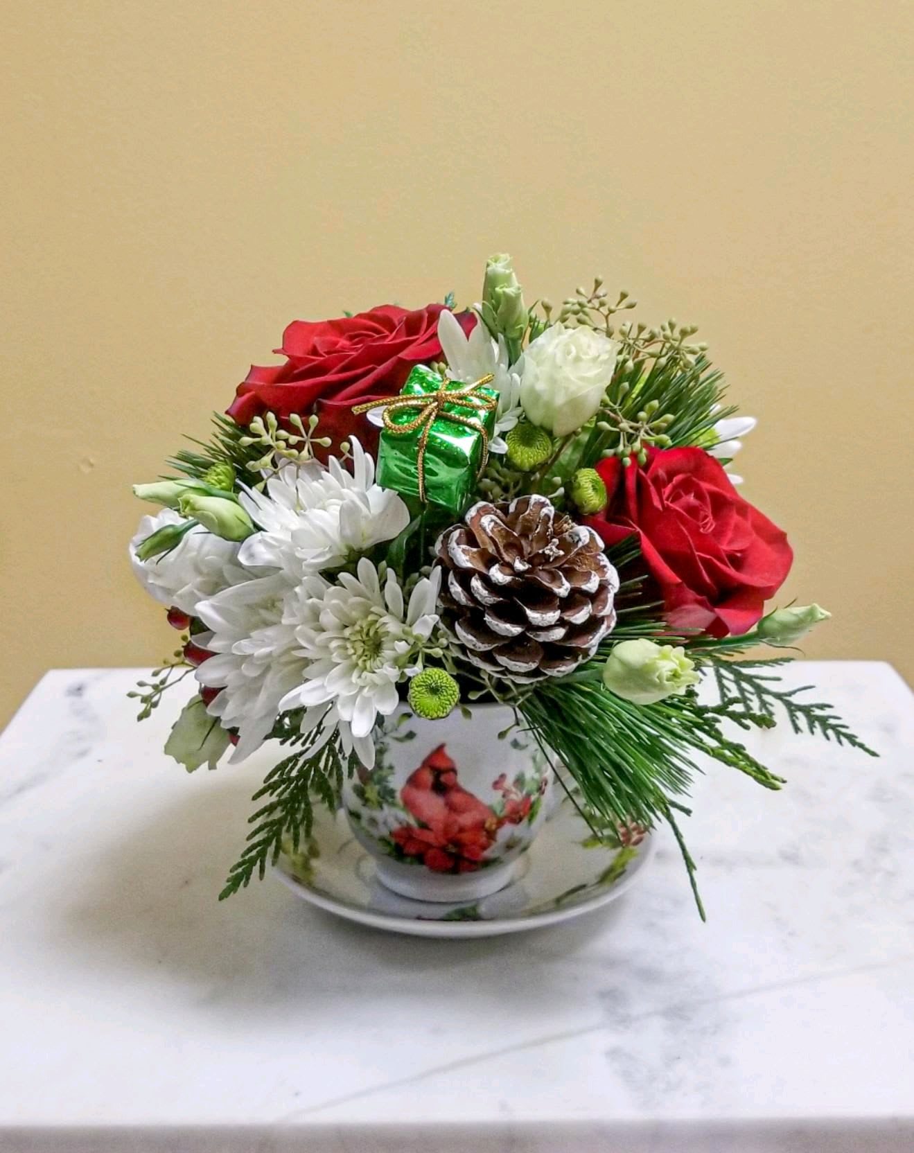 Holiday Tea Time - Victorian Tea cup filled to the brim with hypericum berries, winter greens, and seasonal blooms. When the flowers are done, you can use the cup for your favorite hot beverage! 