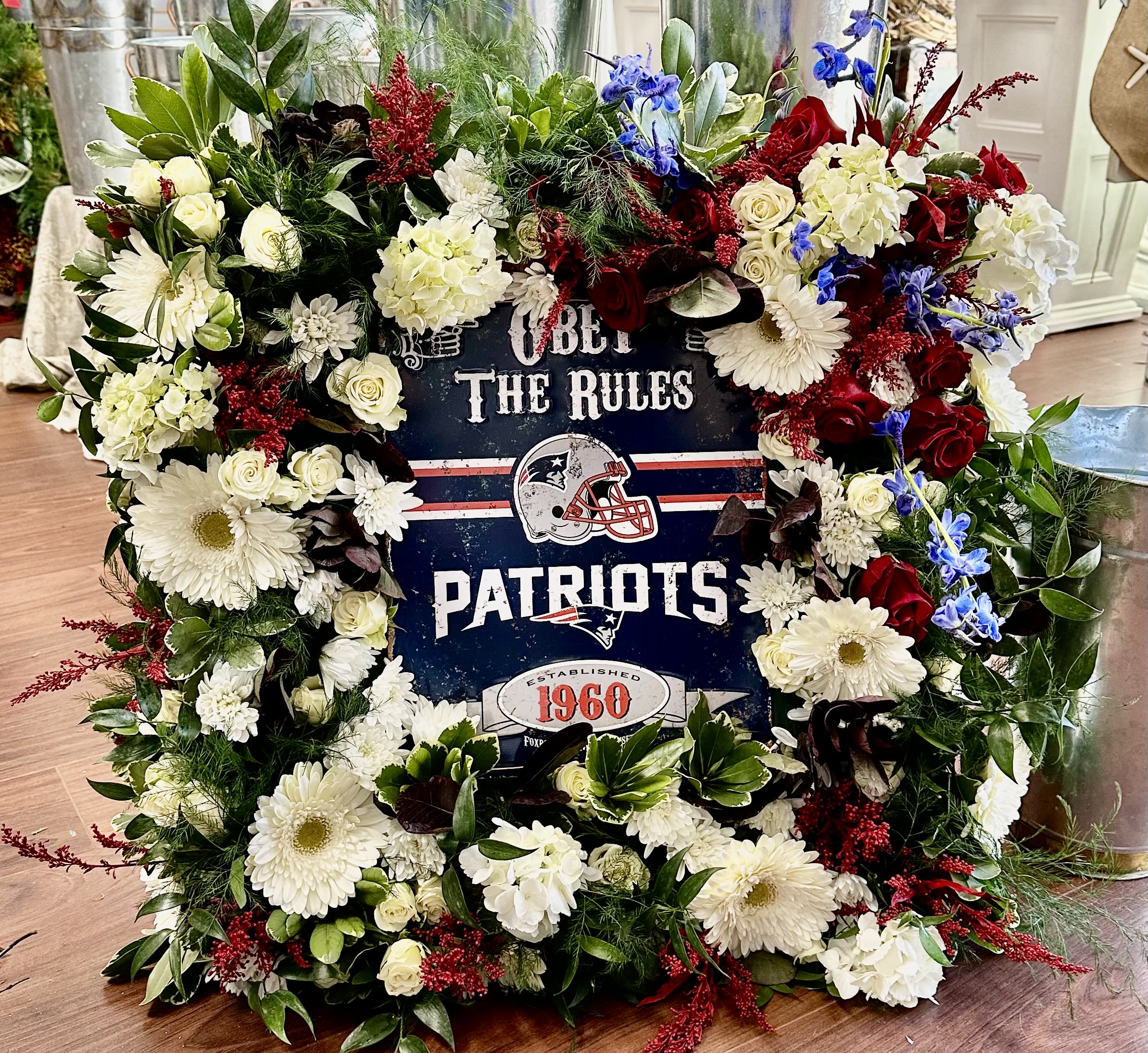 The Sports Fanatic!  - This is a custom designed display for someone who was a Sports Fanatic!!  The base it is created on is 22x22 , so it only gets larger from there.  Please give as much advance notice as possible when ordering so that we may create it to their favorite Team!!  This is perfect presentation from a group of friends . 