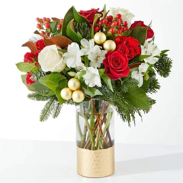 Joy &amp; Jolly Bouquet - Spread joy this holiday season with a shimmering arrangement of roses, alstroemeria, and the incredible scent of seasonal greens.  Details The Premium Bouquet is approximately 17"H x 18"W. Designed by florists, ready to display. For long–lasting blooms, replace the water daily. We suggest trimming the stems every couple days. Pet Safety Precautions: This bouquet or plant may include flowers and foliage that are known to be toxic to pets. To keep them safe, be sure to keep this arrangement out of your pet's reach.