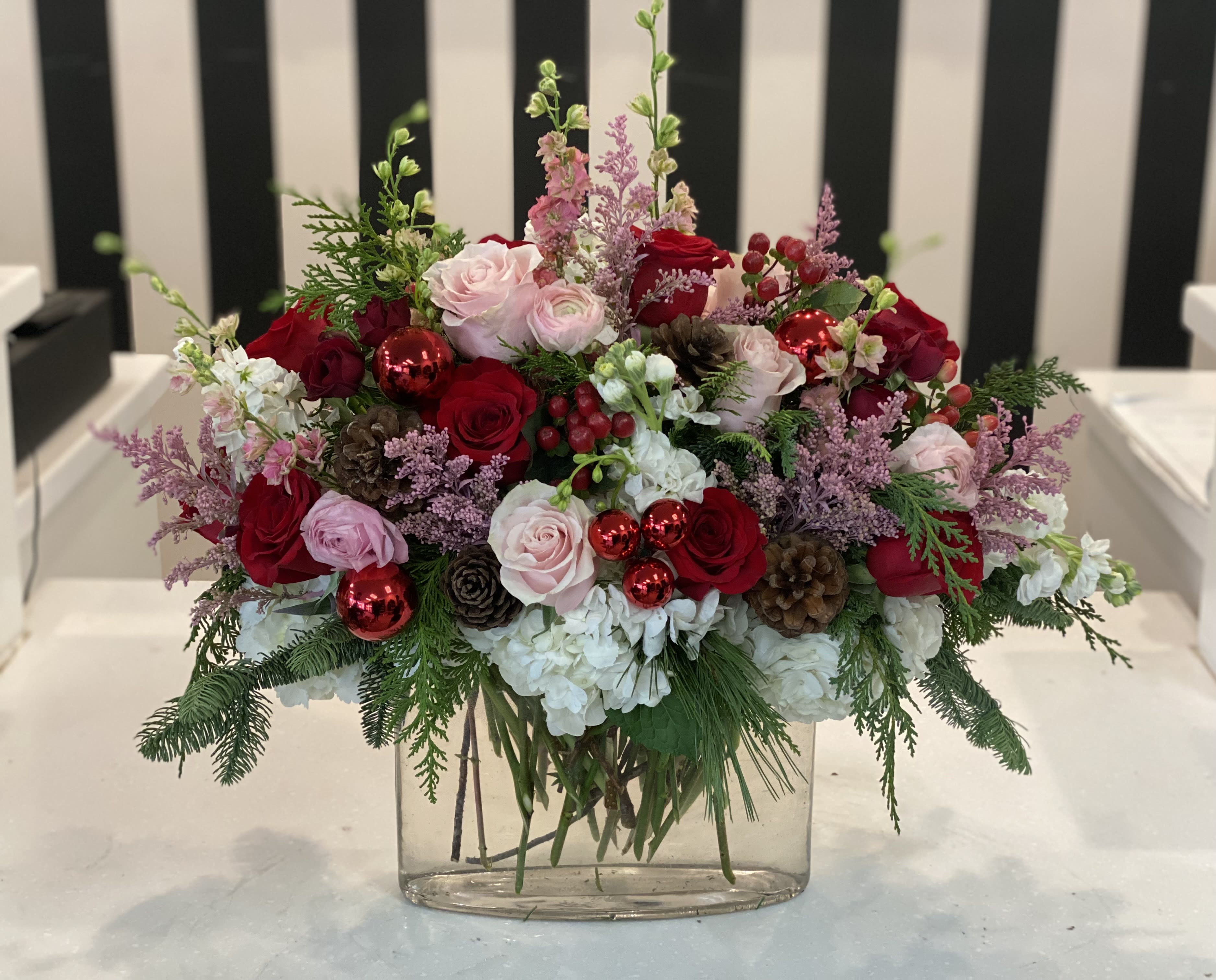  Pink Christmas - This is a gorgeous feminine take on a pink Christmas, made with fresh premium flowers, pine cones and decorative ornaments.