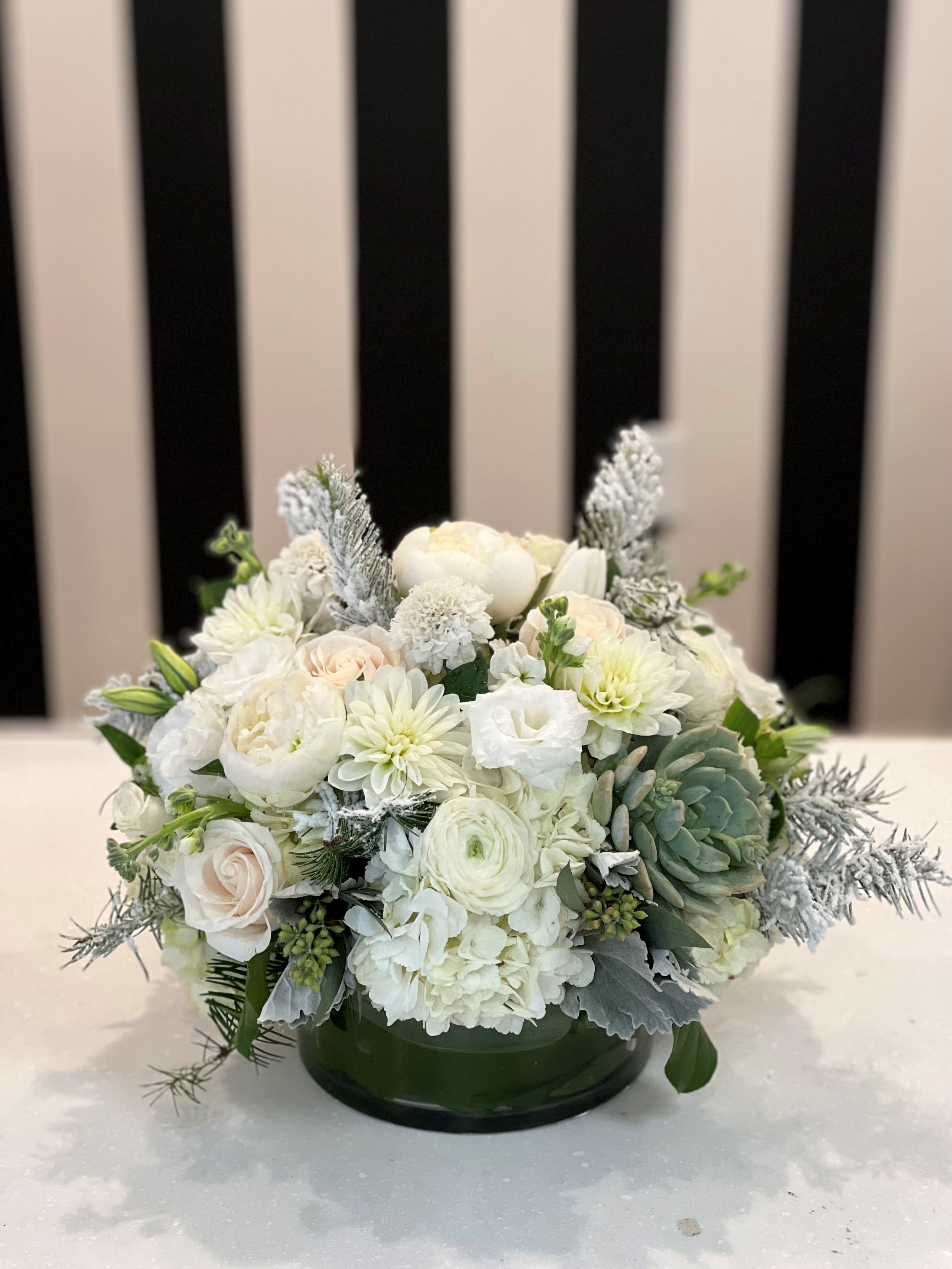 Frosted Christmas  - Mixed arrangement of white flowers, succulent, Christmas greens and a touch of winter frost!