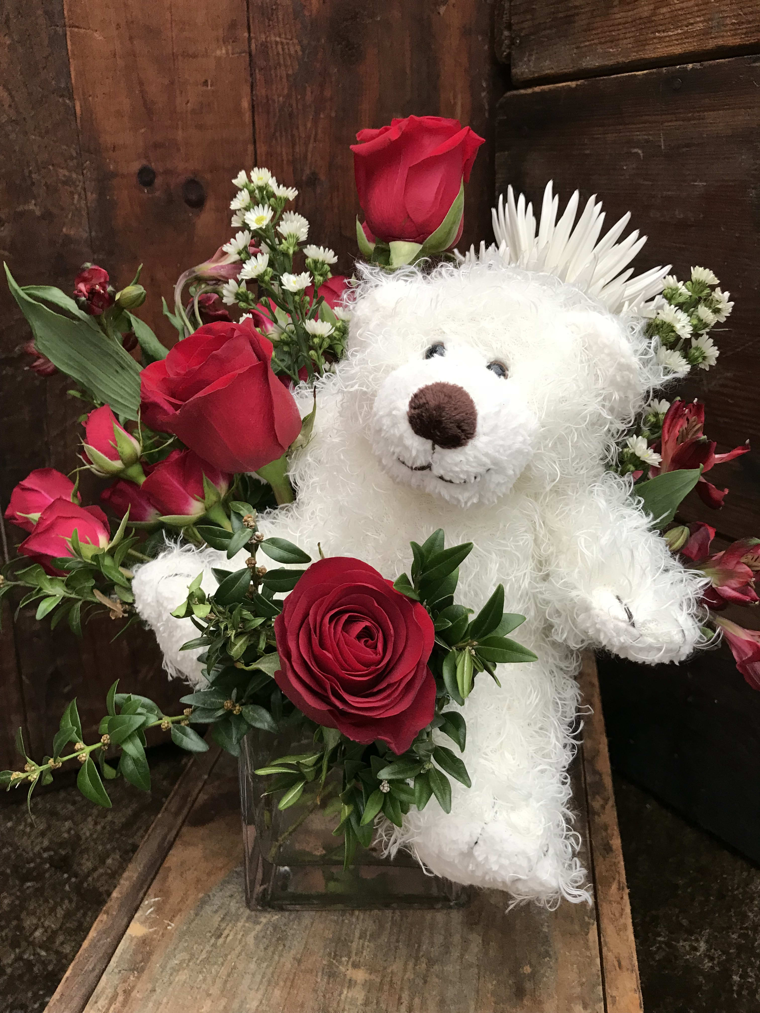 Be My Valentine - Our artisan handmade arrangement's overall theme is shades of red. Arrangements could also be pink, yellow, or white.  The actual bouquet or arrangement may not precisely match the photo,but its temperament will. The freshest, artisan flowers available are used to create an exquisite arrangement especially for you. We also use a variety of unusual greenery for an example eucalyptus, salal (lemon leaf), pittisporum. Occasionally, substitutions of flowers or containers happen due to weather, seasonality and market conditions which may affect availability. If this is the case with the gift you've selected,we will ensure that the style, theme and color scheme of your arrangement is preserved and will only substitute items of equal or higher value. 