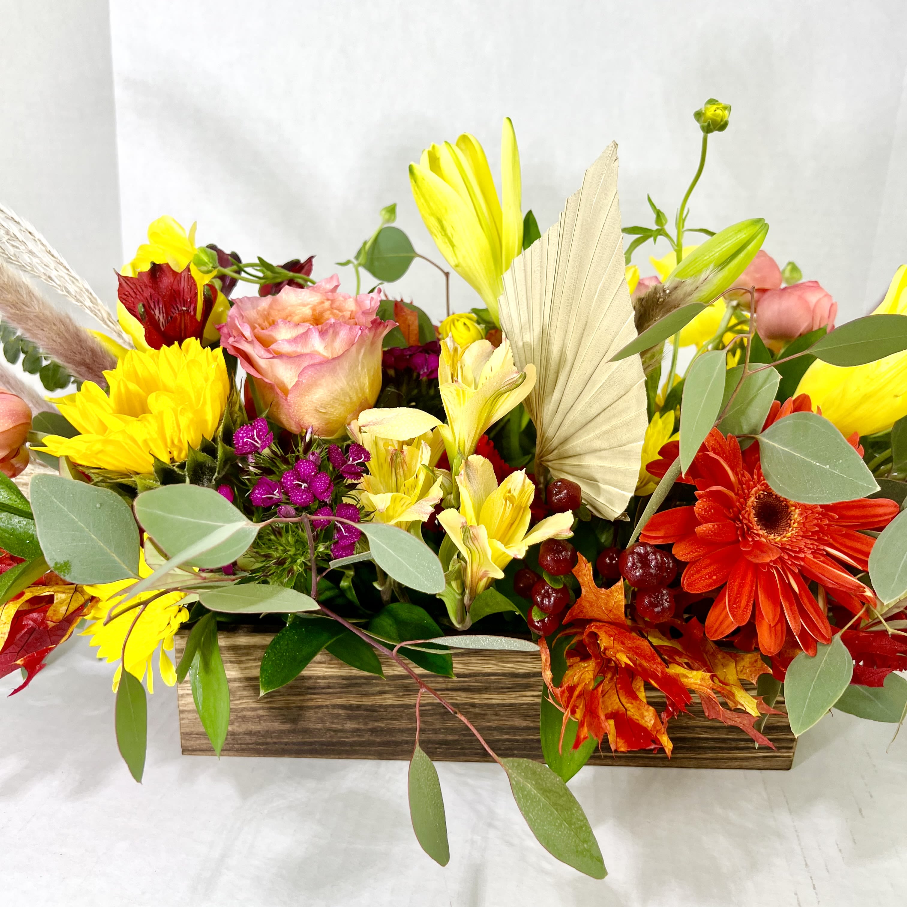 Modern Fall Centerpiece - Fall flowers for the modern table in a trendy, dark wooden box.  This arrangement works best on a rectangular table and can have candles added if requested.  Also a great choice for the office front desk, or for the coffee table.  