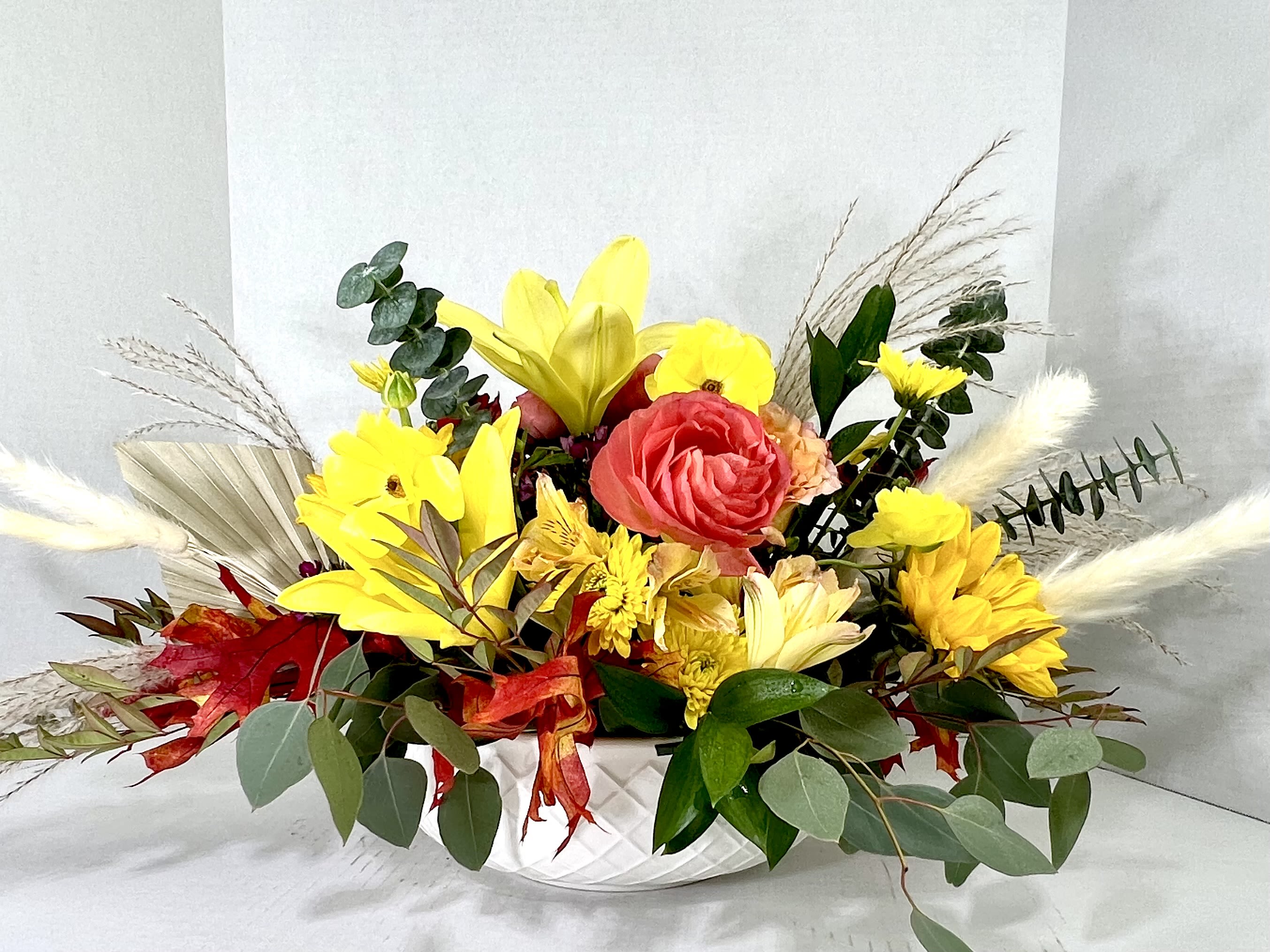 Keepsake Fall Centerpiece - This is an extra large round Fall Centerpiece in a white Keepsake Serving Bowl.  Beautiful flowers for your favorite host or hostess.  Fresh flowers elevate any gathering to a special occasion- Just add flowers!