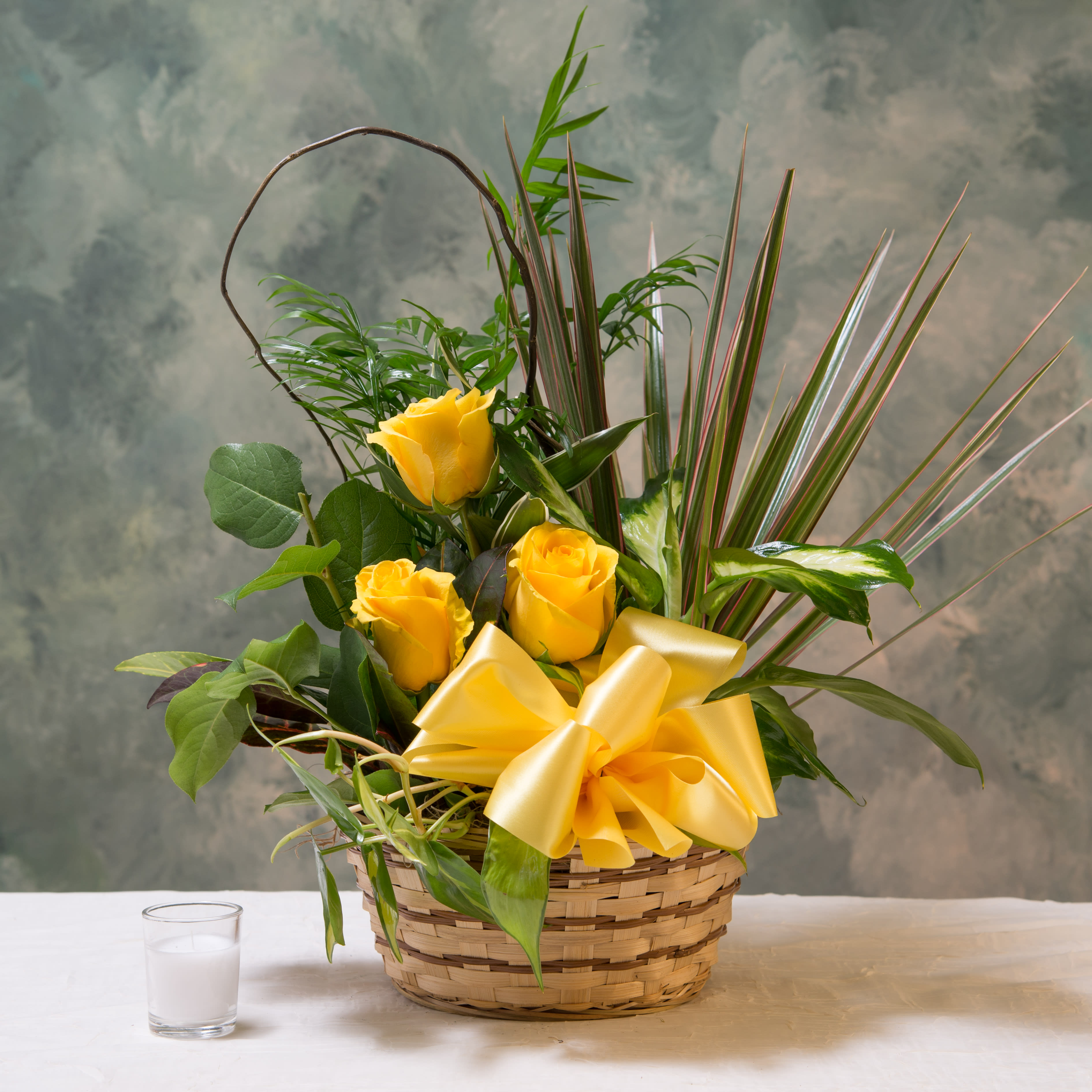 Dish Garden With Fresh Flowers - Bring the outdoors into your living room. This yellow rose dish garden with a golden ribbon bow is the perfect natural accent to spruce up your home. Add in the wicker basket and the assorted greenery, and you've got a fresh and gorgeous arrangement. 