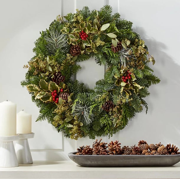 Decorated Natural Wreath  - A great way to start the season off by sending your loved ones a festive wreath for their door. Natural looking fruit and berry decorations are surrounded by a variety of fancy Christmas greenery. ** Decorations vary depending on availability. 