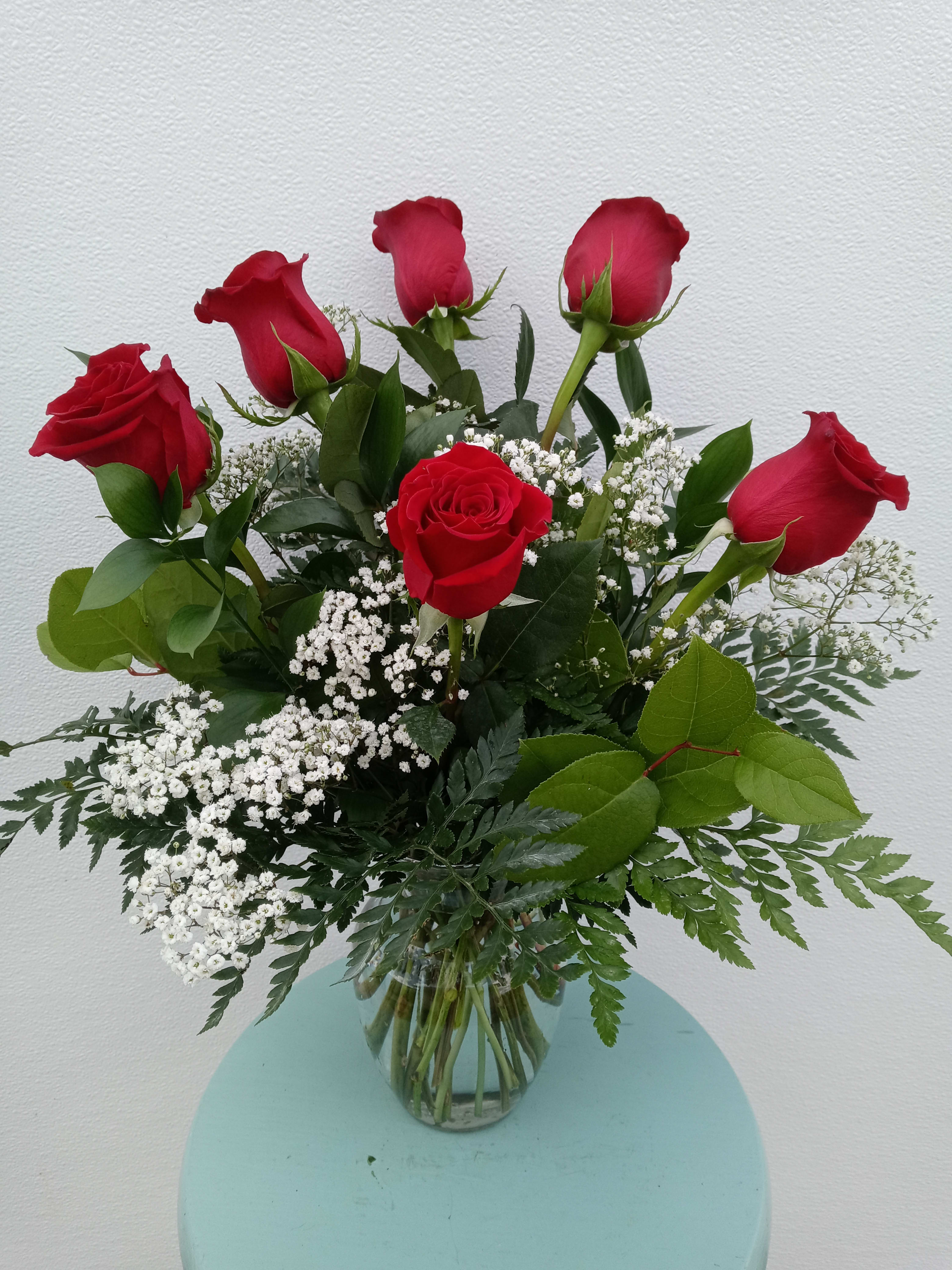 Half dozen red roses - Half dozen red roses arranged in a vase. Upgraded option will have other flowers to complement the roses.