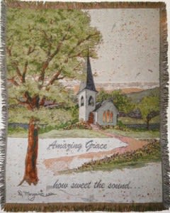 Amazing Grace Throw - Comfort Tapestry Throws can be used in so many different ways to express a multitude of sentiments. Delivered as is, folded with a bow on top. Would be an expression with words that often we forget to speak aloud. Order Deluxe to have your blanket delivered on an easel. 