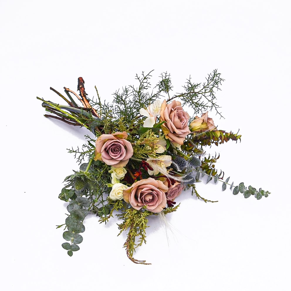 Jane Austen - Muted vintage mauve and taupe tones mixed with deep burgundy and sapphire accents remind us of a victorian romance. The perfect style to curl up by the fire and read a good book with.  PLEASE NOTE: Standard price-point is a hand-tied bouquet with no vase. Approximately 12&quot; across the top of the flowers  Deluxe price-point is a low and lush arrangement presented in a short glass cylinder. Approximately 18&quot;W x 12&quot;H  Premium price-point is a high and tall arrangement in a tall cylinder. Approximately 20&quot;W x 24&quot;H.