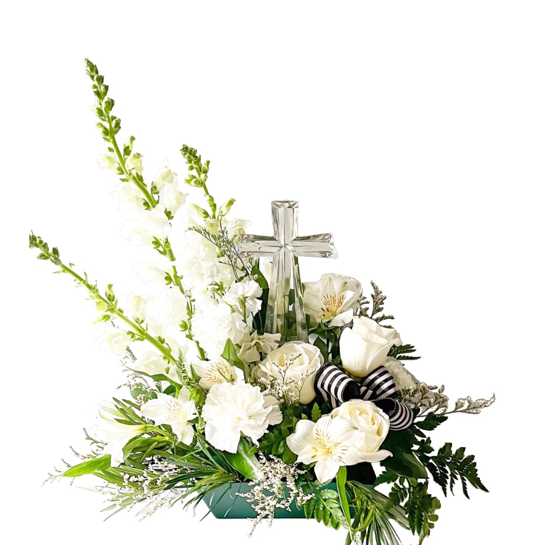 Crystal Cross - This arrangement is all white flowers with a crystal cross in the middle.  Makes a nice sympathy keepsake. Arrangement is also available in your choice of flower color, please note in special instructions.  Small Cross: 8.5 inches x 4.5 inches  