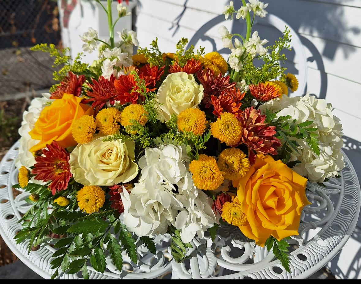  Long and Low Table Centerpiece - Hydrangea, roses, daisies, button poms, stock and solidago in a long and low dish
