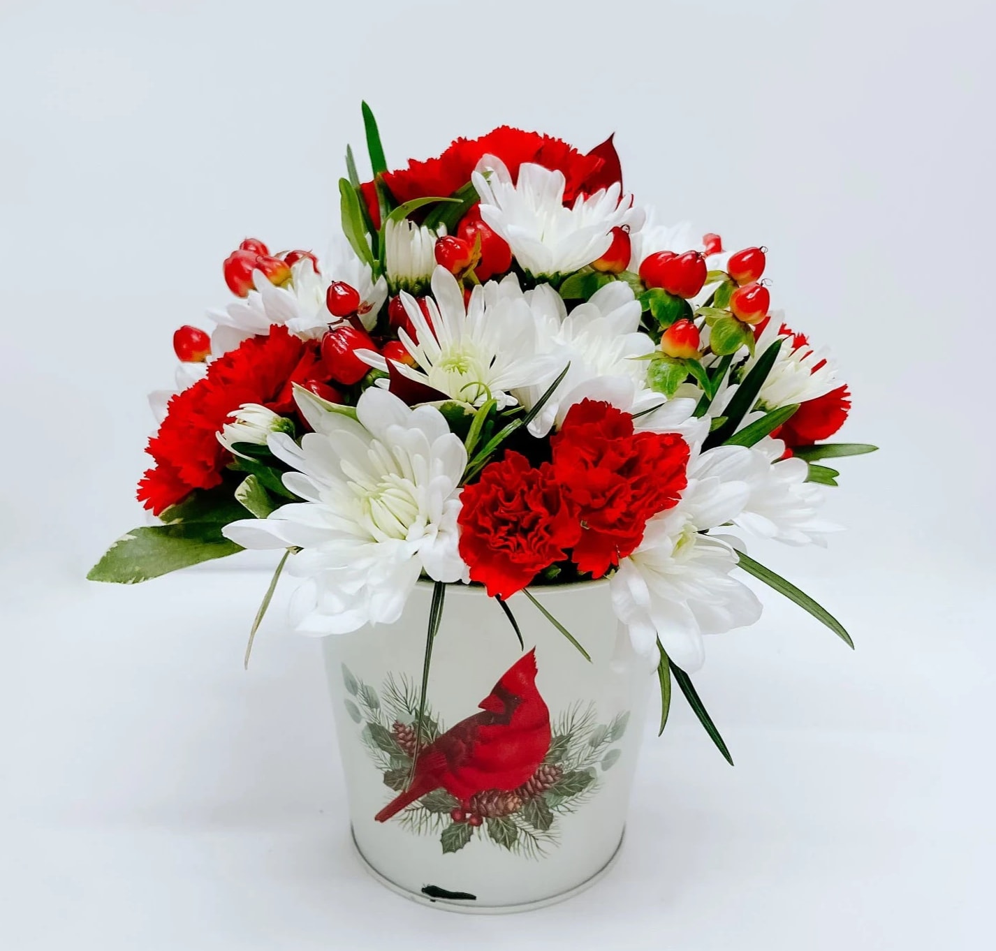 A CARDINAL CHRISTMAS - Cardinals are always a sign from our loved ones.  Send out this beautiful arrangement to your loved one this holiday!