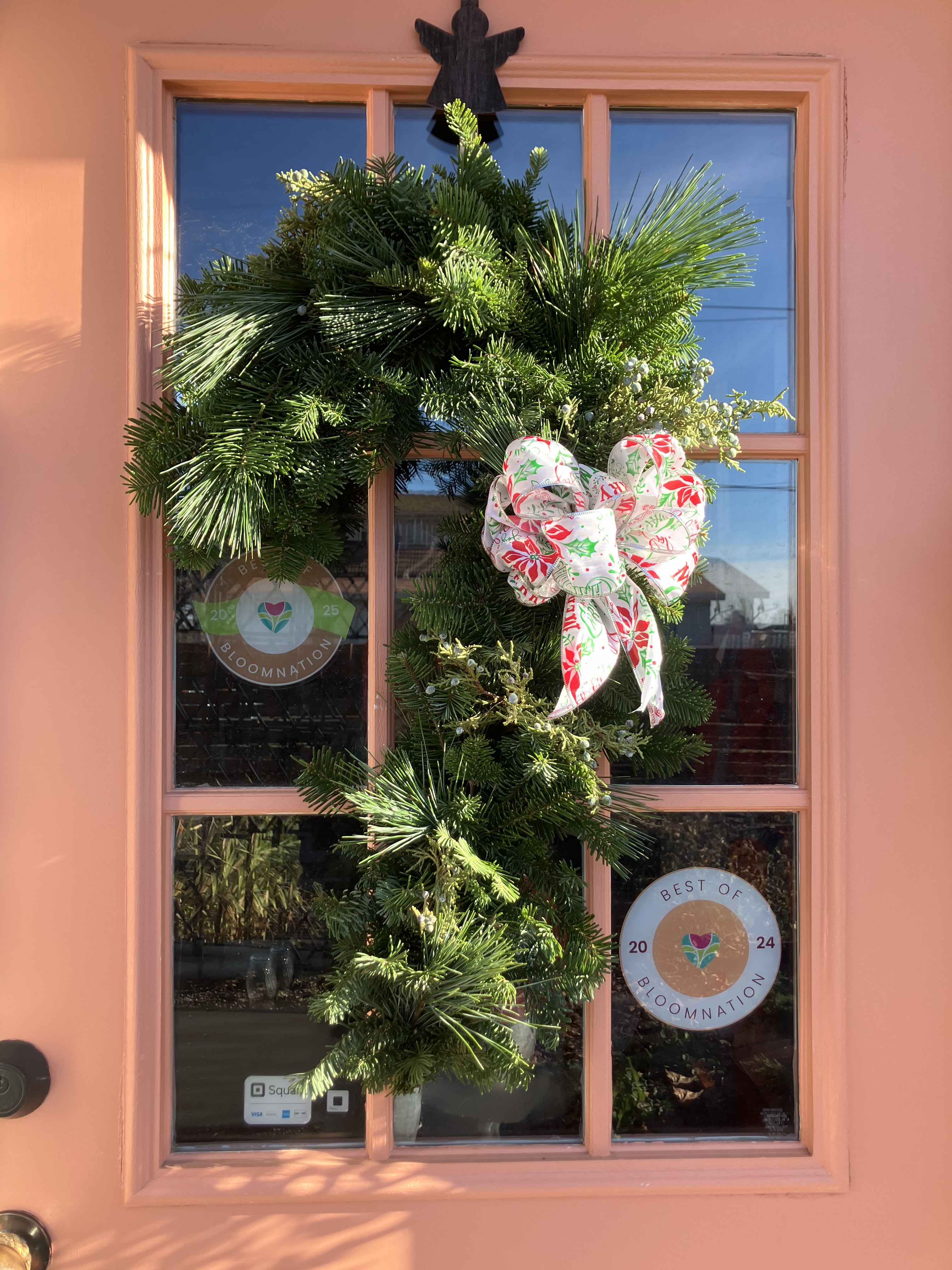 Candy Cane Evergreen Wreath - Cute fresh evergreen wreath, fun decor for your door this winter season. Made by hand with a bright bow. 