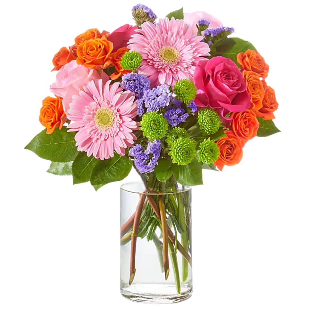 Fiesta Bloom - Fiesta Bloom is a vibrant celebration of color, radiating warmth and energy with its bold mix of hot pink, orange, and lime green. Gerber daisies add a playful touch, while the bright pomps and elegant spray roses offer depth and texture. This arrangement captures the spirit of a lively fiesta, infusing any space with joy and excitement. Whether for a celebration or just to brighten your surroundings, "Fiesta Bloom" brings the perfect burst of color and fun to any occasion.