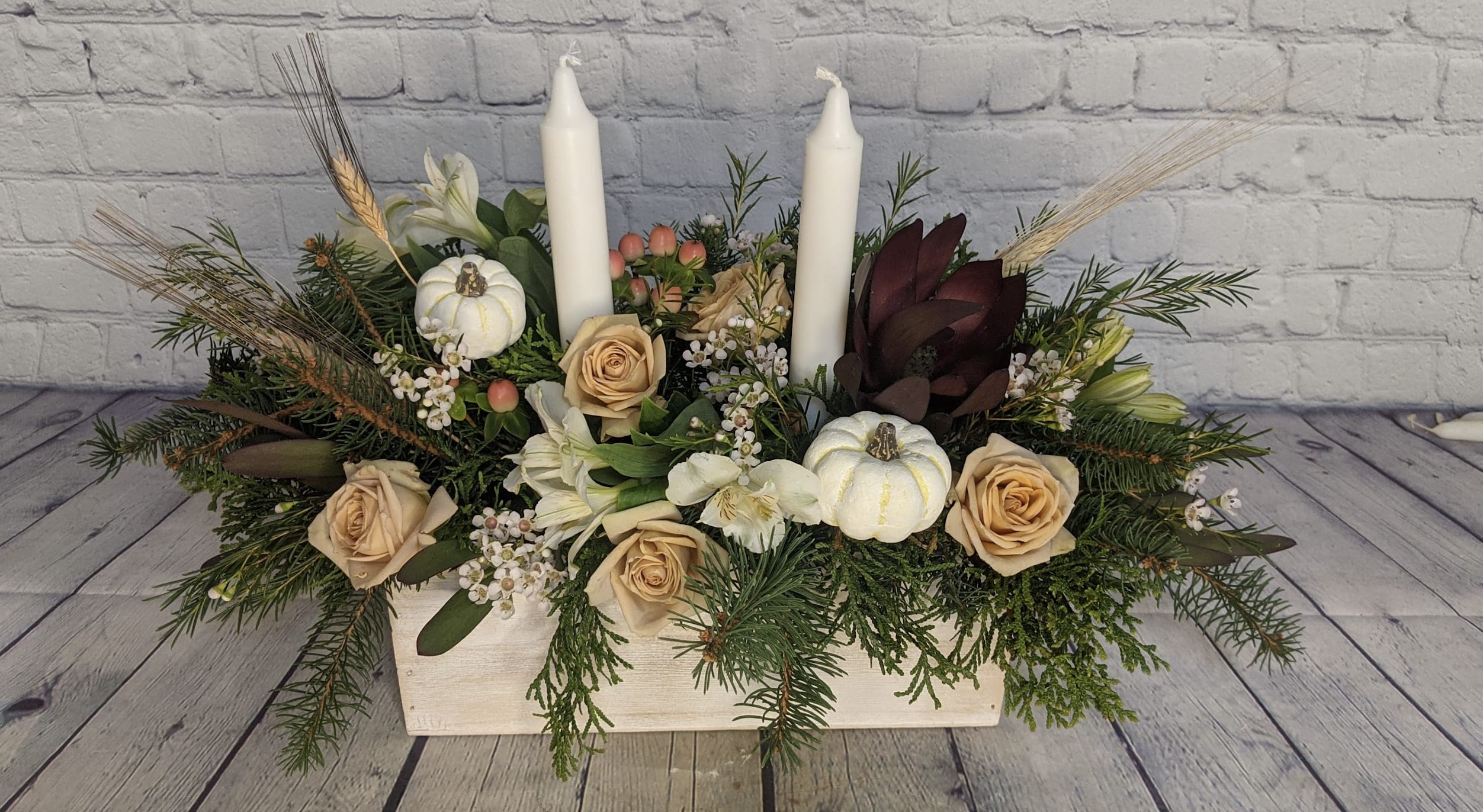 Count Your Blessings - This attractive centerpiece is a household favorite. Whether you're decorating the table for Thanksgiving dinner or just love these neutral fall colors; this bouquet is sure to be a hit this autumn season. 
