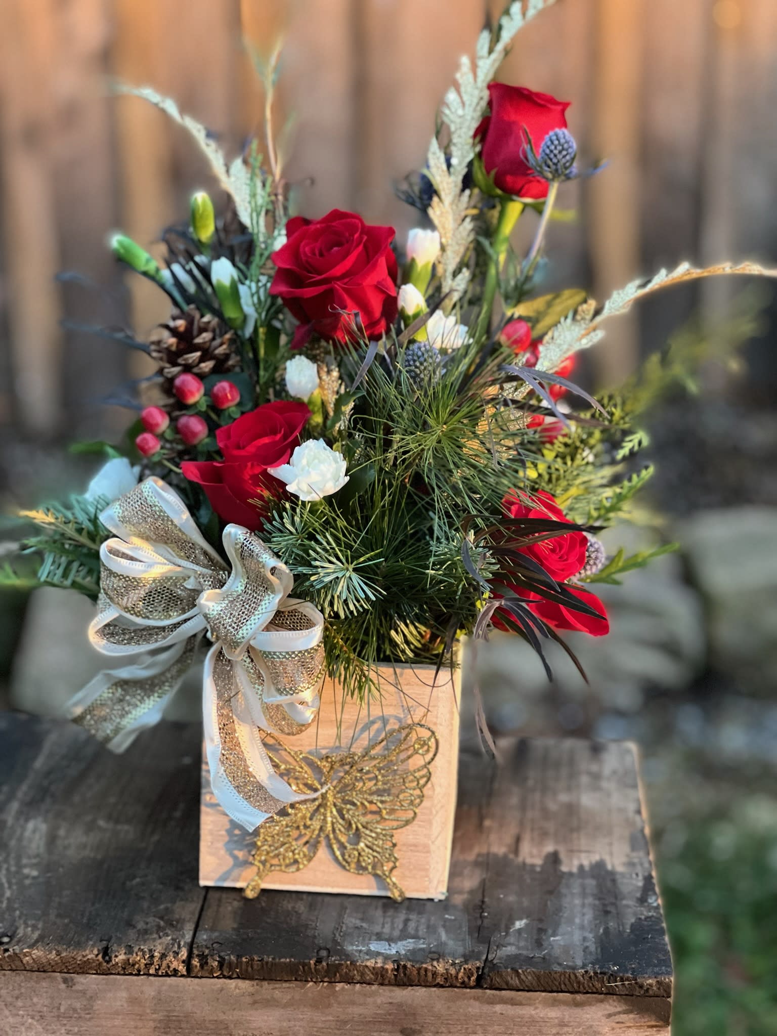 Butterfly Christmas - A beautiful Christmas arrangement in a rustic wooden box with a keepsake glittery butterfly ornament