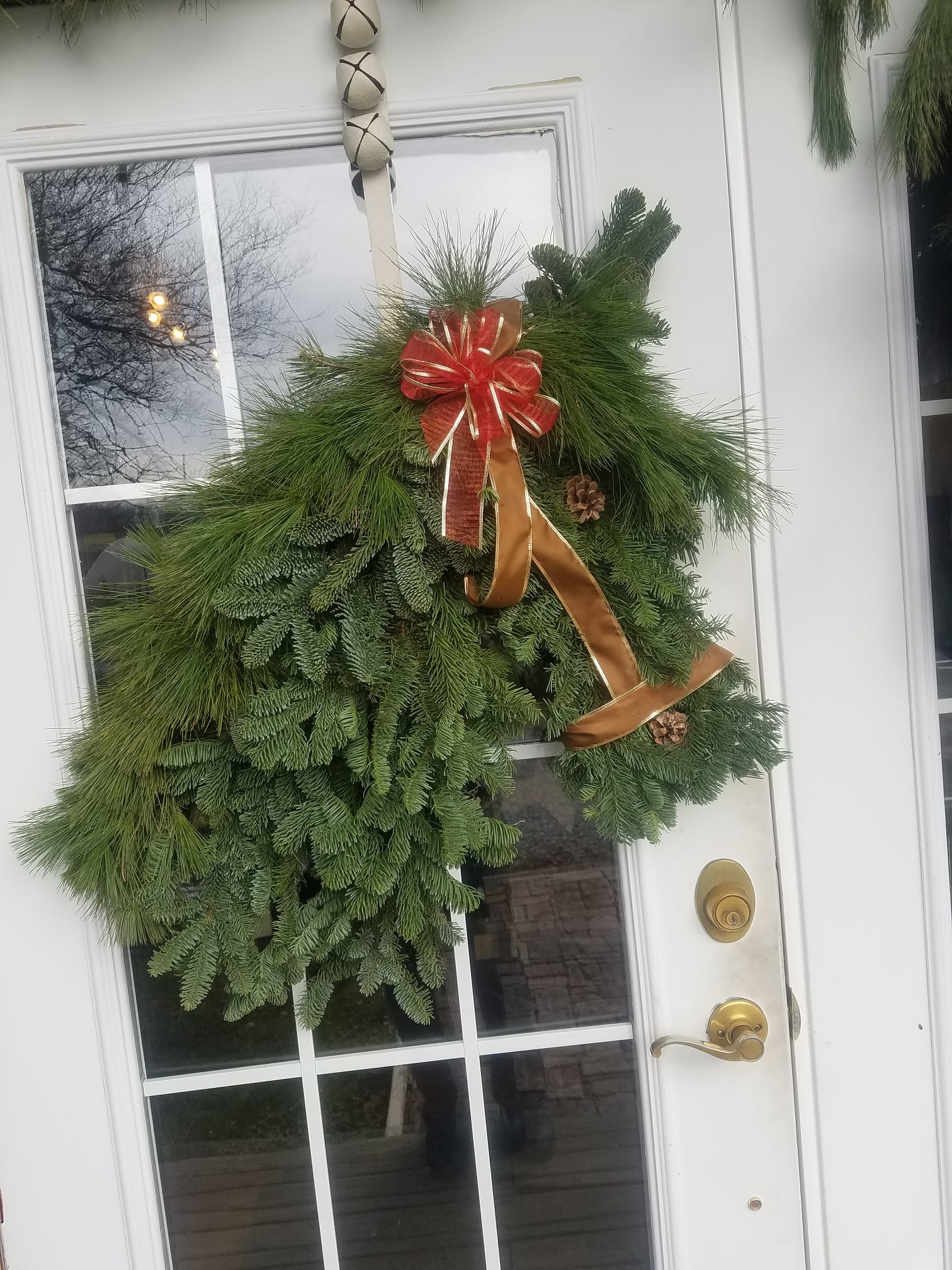 Christmas Horse Wreath  - This unique wreath is made in the shape of a horse head! This beautiful piece is perfect for the horse lover in your life! We can customize the color of the halter, or add flowers and bows to match your style.Great on a front door, or the side of your barn.
