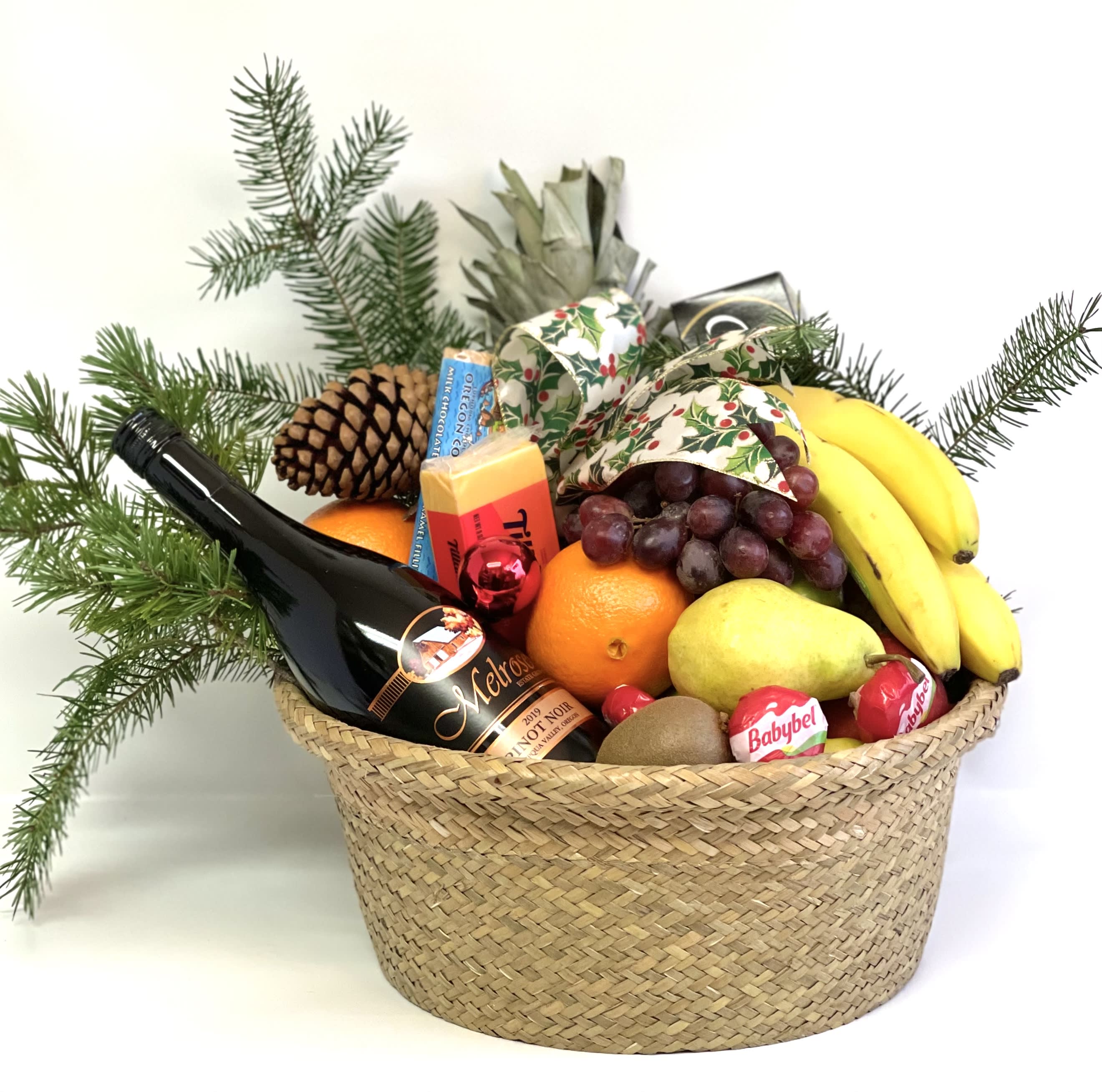 Holiday Gourmet Fruit Basket w/Wine by Barb’s Flowers - Perfect gift for the holiday season. Assorted fruit, crackers, meat, nuts, cheese, candy, wine from a local winery Melrose Vineyards.  Sure to bring a smile to anyone in the holiday season. 