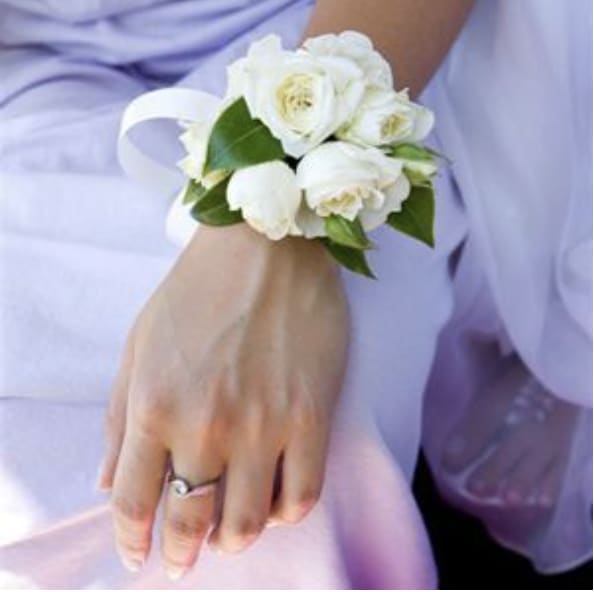 Garden Blooms Corsage  - Add-On Item — Not Available for Individual Purchase  This product is exclusively offered as an add-on item within our wedding packages and is not available for individual sale.Please note if this is ordered your order will be cancelled, and your money will be refunded.