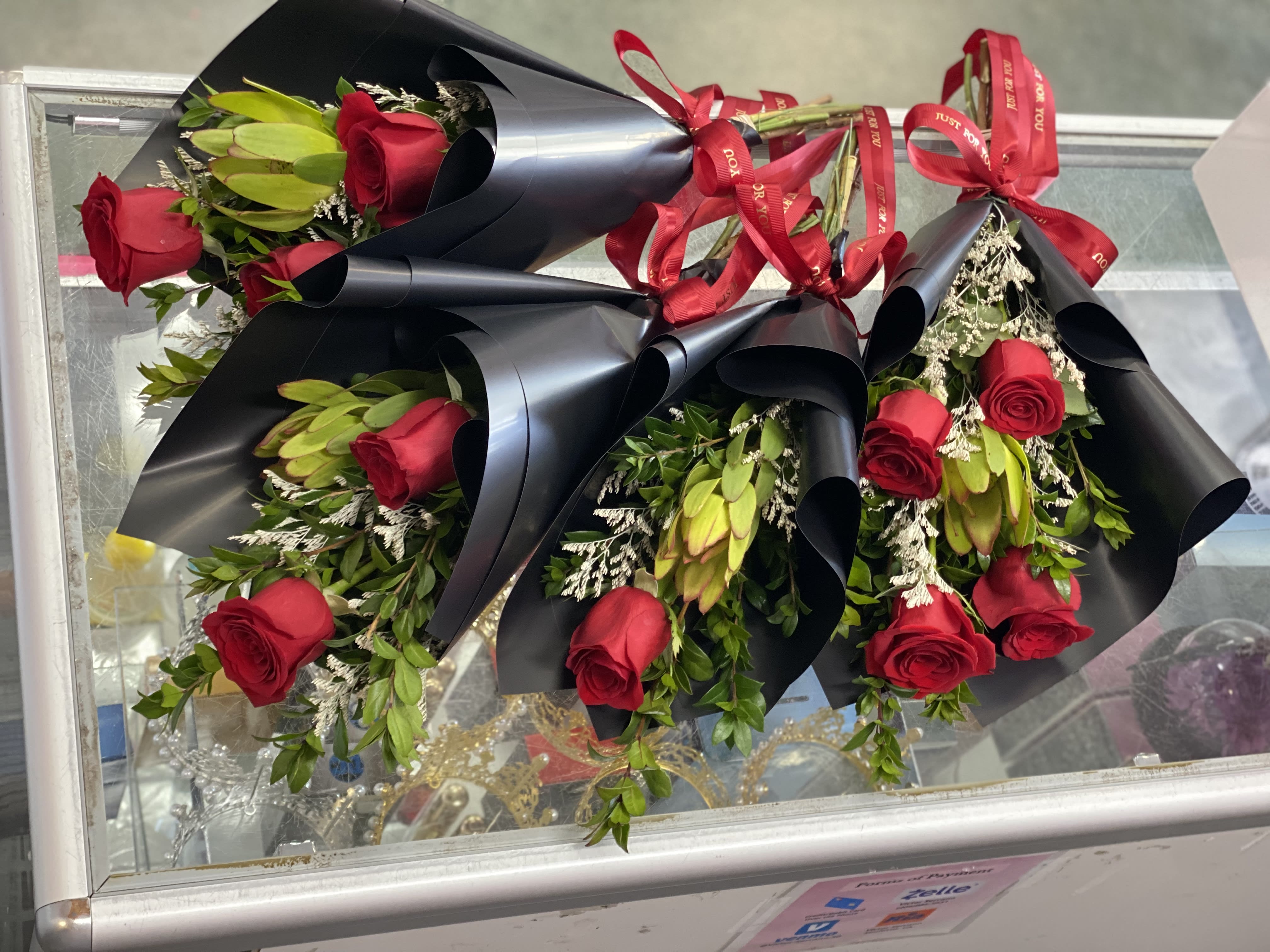 1, 2, or 3 Roses Arranged &amp; Wrapped - Request your colors otherwise we will do them RED.  Theses will include greenery, fillers, colored paper, and bow. 