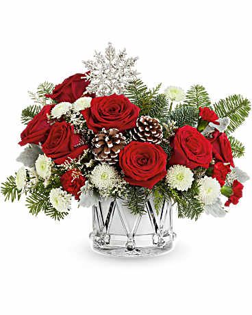 Little Drummer Bouquet - Crystal Drum filled with red roses, red and white carnationsand and vareity of winter greens and pinecones.