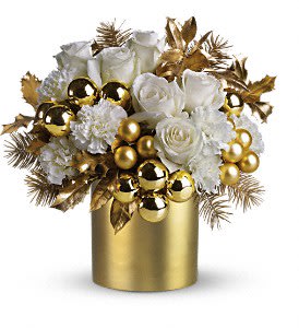 Belle of the Ball - Whether you're hosting the holiday festivities or invited to an exciting soirée, this stunning bouquet radiates sophistication and style.  Beyond beautiful. White roses, carnations, gorgeous golden ornament balls, holly and Douglas fir are perfectly arranged in a gold satin cylinder vase. This arrangement really shines!  Approximately 11&quot; W x 11&quot; H  As Shown : TT131-1A 