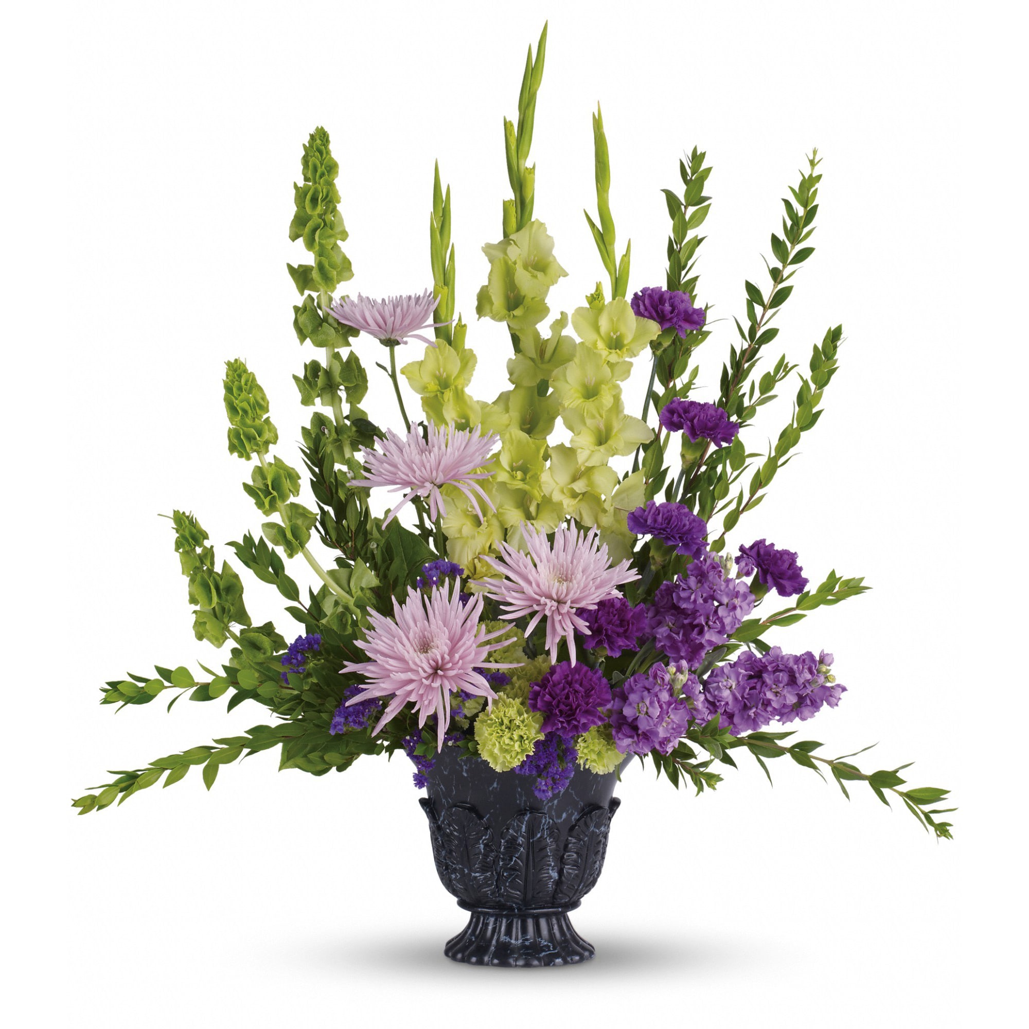 Teleflora's Cherished Memories  - This ethereally lovely bouquet of green gladioli, lavender stock, purple carnations and more in a timeless-tribute urn is a stunning choice for the memorial service.  