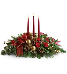 All is Bright - Miniature carnations are artfully on display with merry touches like shimmery ornaments, pinecones, berries, organza ribbon and holiday greens. Three graceful red taper candles add the perfect magical touch. Approximately 23&quot; W x 16&quot; H