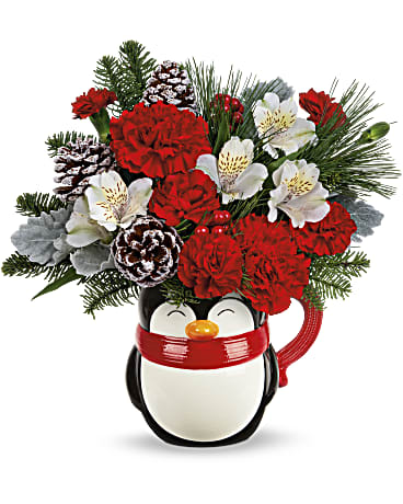 Teleflora's Send A Hug Snowy Smiles Bouquet - Send smiles across the snowy miles with this happy holiday penguin! Filled with fresh, festive blooms, this ceramic keepsake is perfect for flowers today, cocoa on Christmas morning!