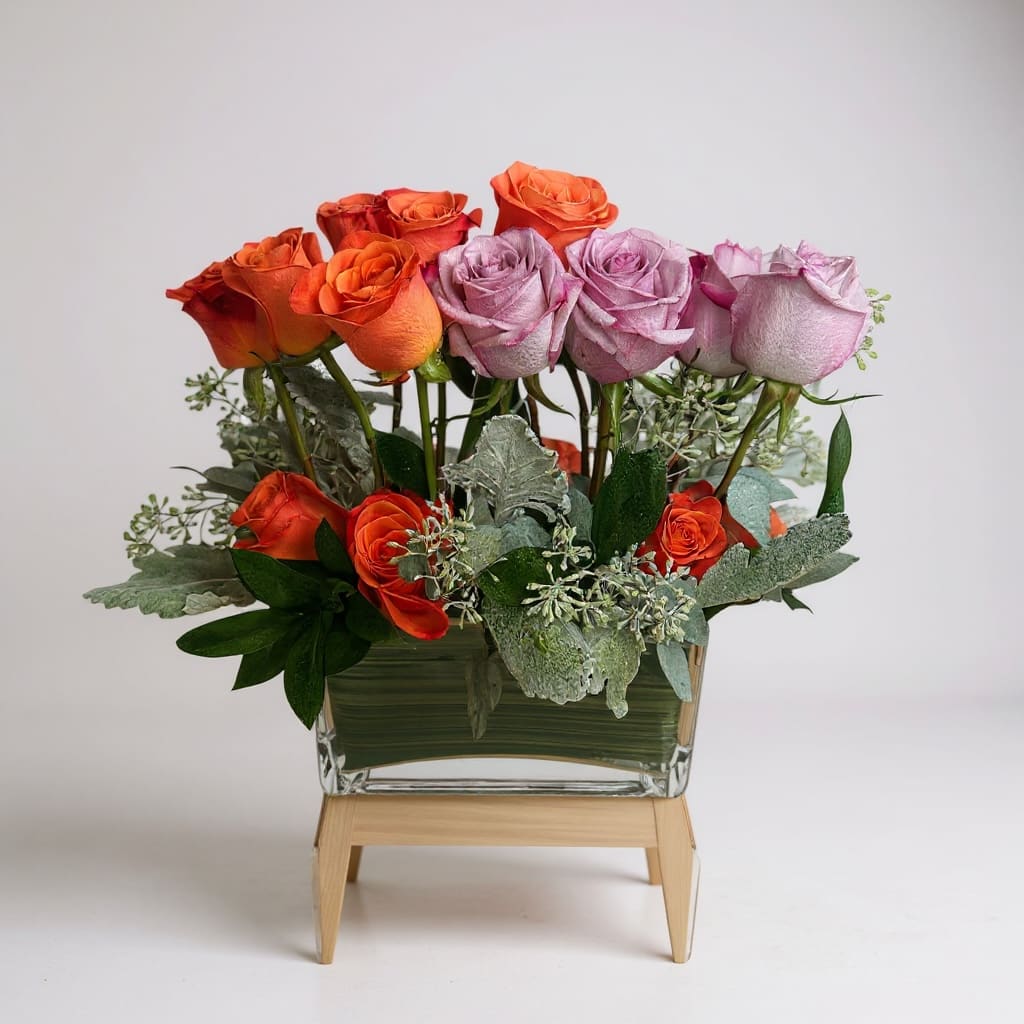 Happy Day Blooms - This luxury arrangement is a lovely and soft rose arrangement that will surely make the recipient gasp. Perfect for Valentine's Day, Anniversaries, or saying "I love you".  Vase Subject to Change