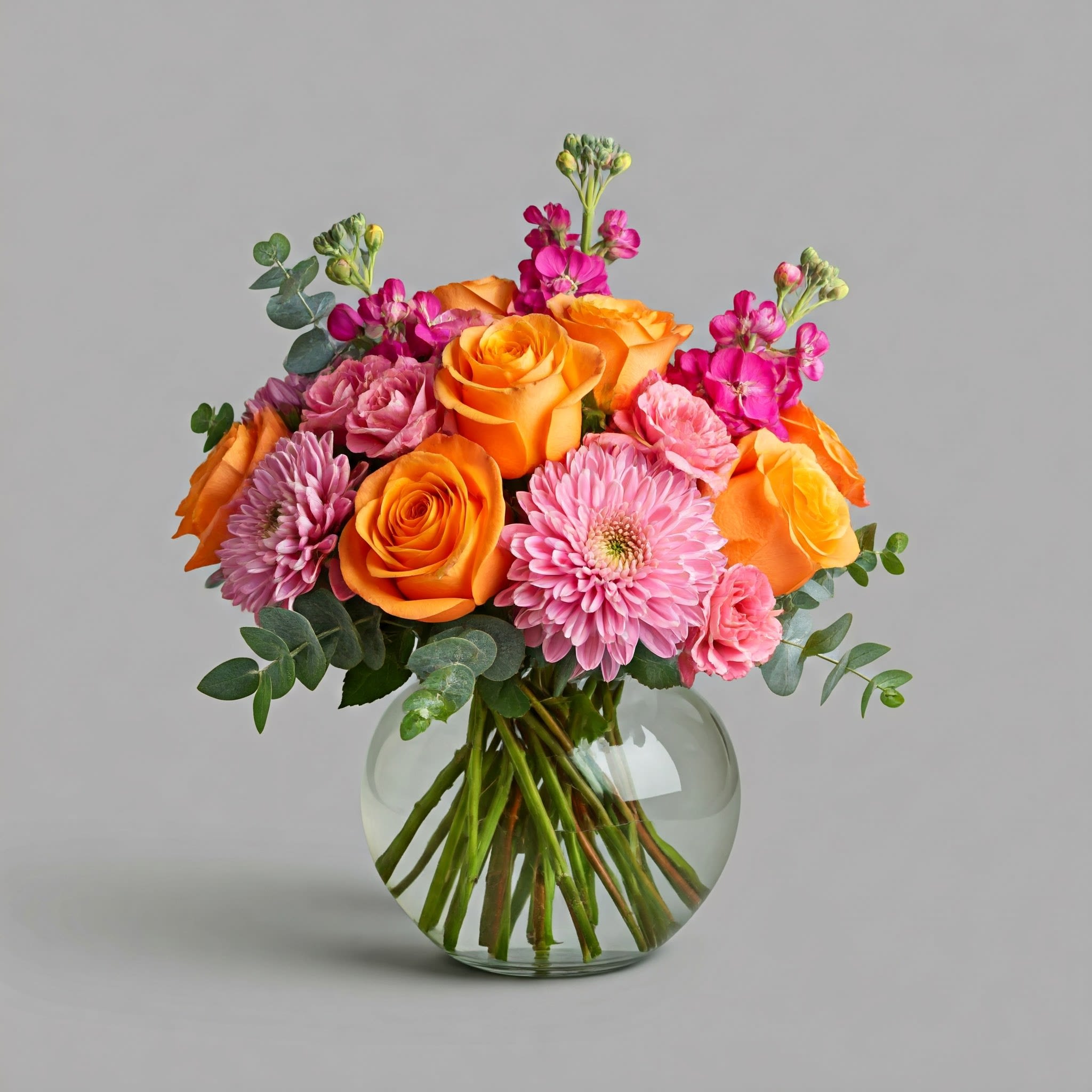 Life of the Party - Celebrate good times with this lively bouquet. The arrangement includes roses, stock, and other seasonal blooms in happy hues! This is the perfect gift for Mother's Day, Birthday, or Just Because. APPROXIMATE DIMENSIONS: 10&quot; D x 12&quot;H