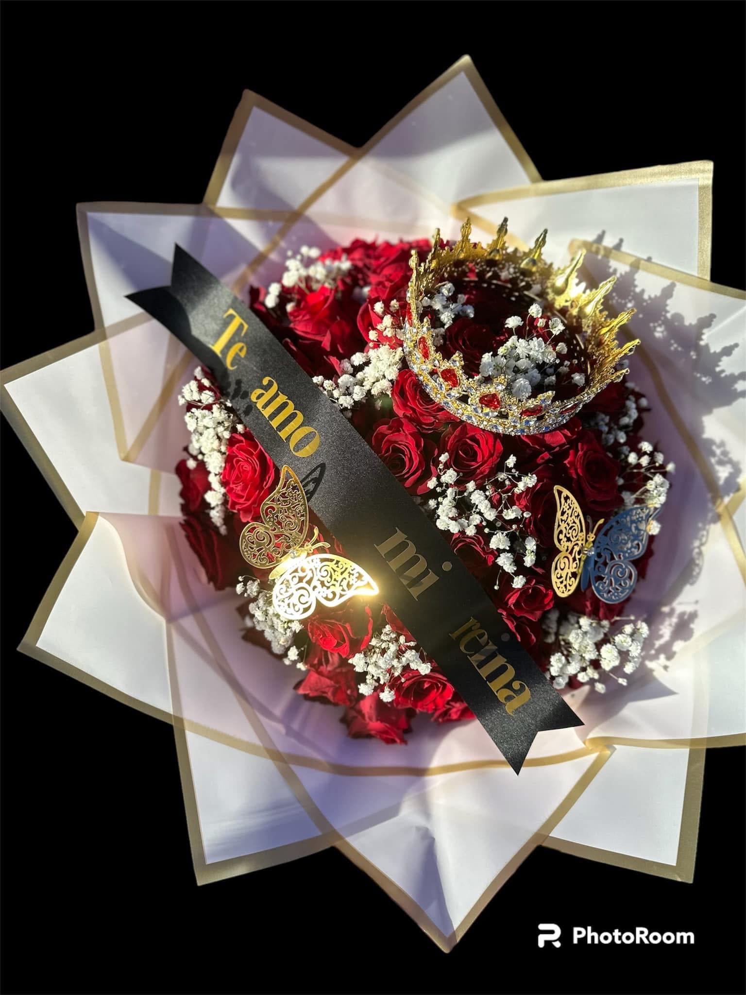 50 red roses with full crown  - 50 red roses with baby breath  Included satin sash butterflies full crown