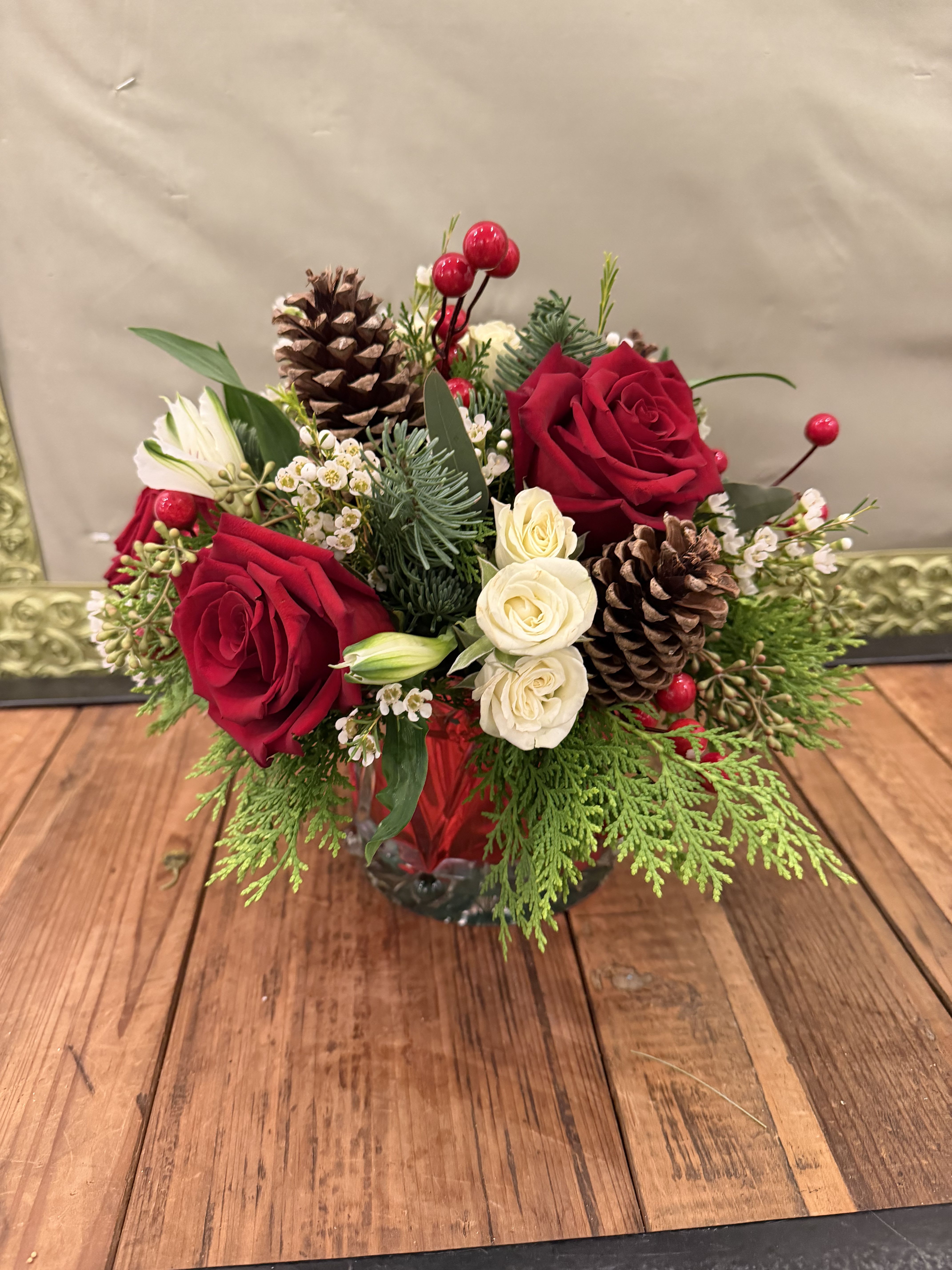 Festive Joy Bouquet - This beautiful floral design in a crystal drum features red and white florals with Christmas accents.
