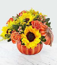 Bountiful™ Bouquet - Deluxe - When you need to say everything and more, say it with the Bountiful Bouquet. An artful blend of sunflowers, roses and hypericum berries creates vibrant hues in one of our most remarkable bouquets. The blooms are arranged to perfection within a keepsake lidded ceramic pumpkin container. More importantly, it has everything that will leave a lasting smile on the recipient's face. GOOD bouquet is approx. 9&quot;H x 11&quot;W. BETTER bouquet is approx. 10&quot;H x 12&quot;W. BEST bouquet is approx. 10&quot;H x 13&quot;W. EXQUISITE bouquet is approx. 10&quot;H x 13&quot;W.