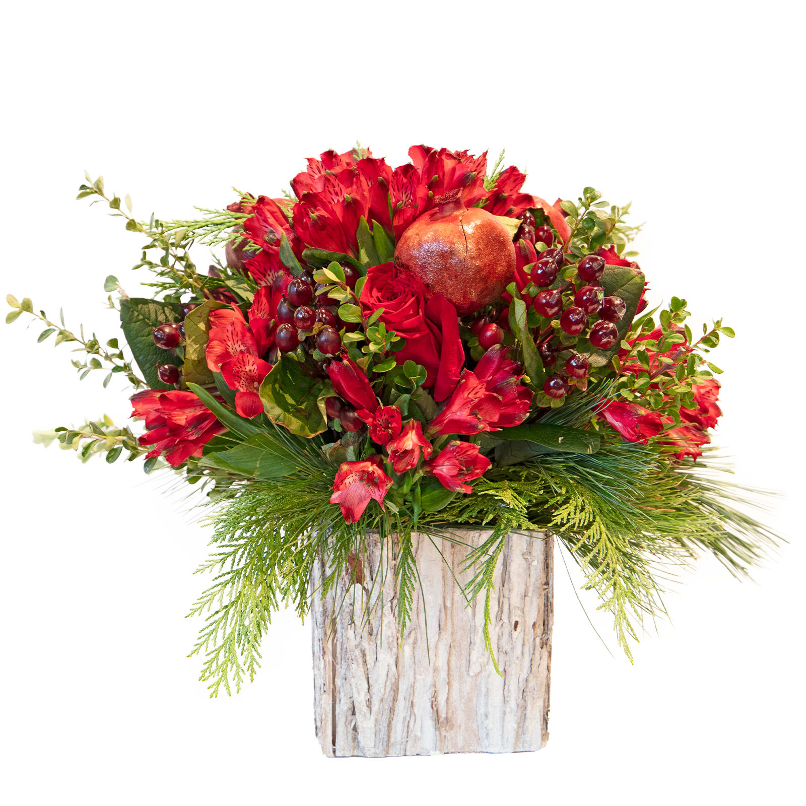 Pomegranate Pine - Capture the sweet &amp; tart flavor of our pomegranate jam inspired arrangement featuring our new Tahoe Bark container. Brought together with real dried pomegranates, lucious alstromeria that will really pop &amp; sweet scented hypericum berries, this fall fruit just turned into our new holiday favorite!