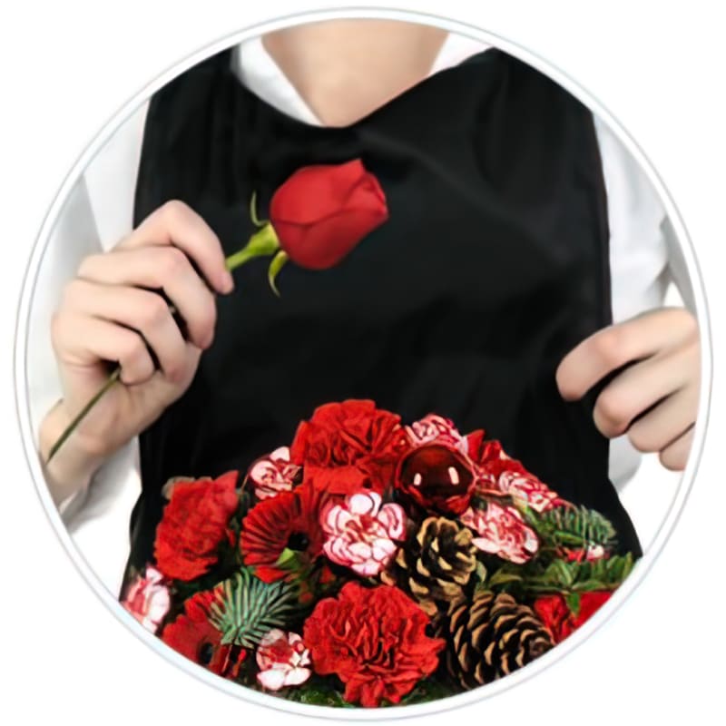 Very Happy Holidays Designers Choice  - Looking to spread holiday cheer? Send them something as special as they are. Picking from our freshest and most delightful blooms, we’ll design a stunning floral gift arranged exclusively with your loved one in mind. Your one-of-a-kind arrangement will include the designer's choice of fresh blooms.