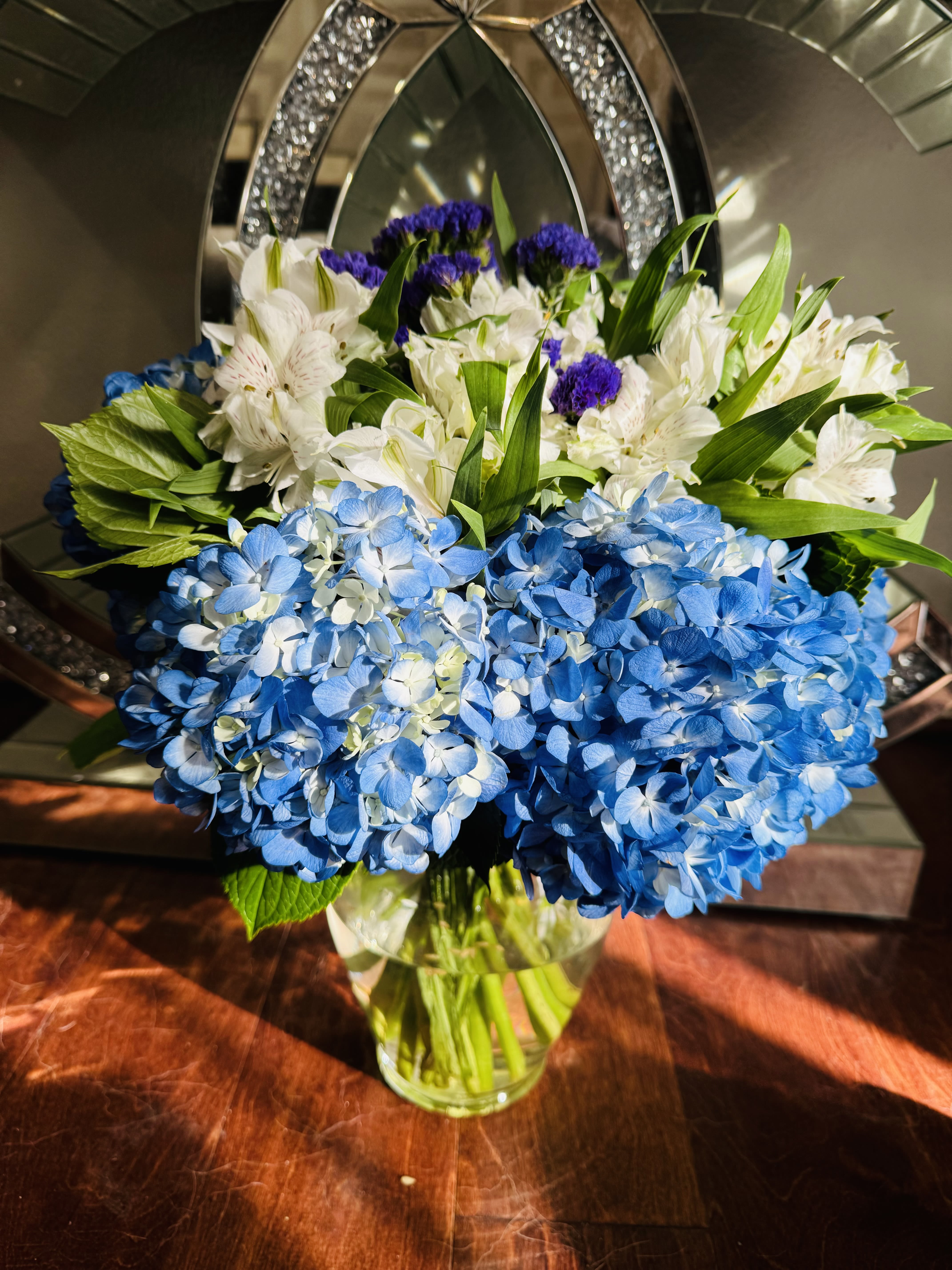White Asters with Hydranges - White Asters with blue Hydrangeas are one of the best choice for any occasion.