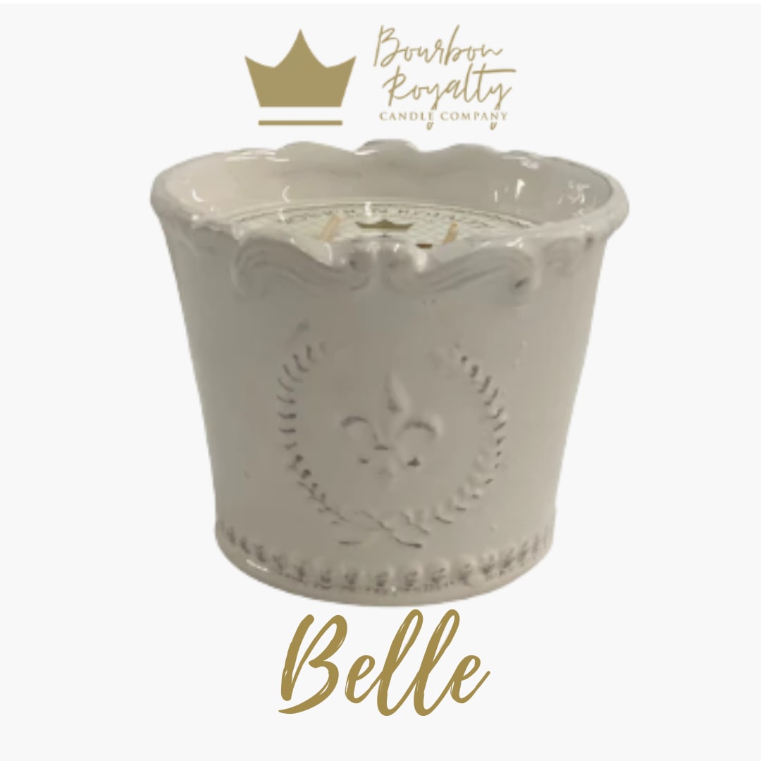 Bourbon Royalty - 10oz Marquis Candle - Belle - This locally made hand poured candle by Bourbon Royalty is the perfect gift for any occasion.  From The Makers: The Marquis Collection captures the hereditary beauty of our original pottery collection. The word marquis comes from the old French language and is known as the ruler of the border area. With the elaborate border on this collection, we couldn’t have found a better fit. The approximate burn time is 40 to 45 hours. Perfect for small kitchens, bathrooms, or bedrooms.  Double Wicked  Looking to gift more than just a candle? Upgrade and add a floral arrangement built on top of your candle! This will not harm the candle in any way, and will make a beautiful statement for your loved one!  ****PLEASE NOTE**** We are unable to deliver this candle by itself. If only looking to purchase the standard level of this candle, it can be picked up in store. Our Minimum for Delivery is $50. If the items in your cart total over this amount (for example, the candle and a floral arrangement) we can deliver it.