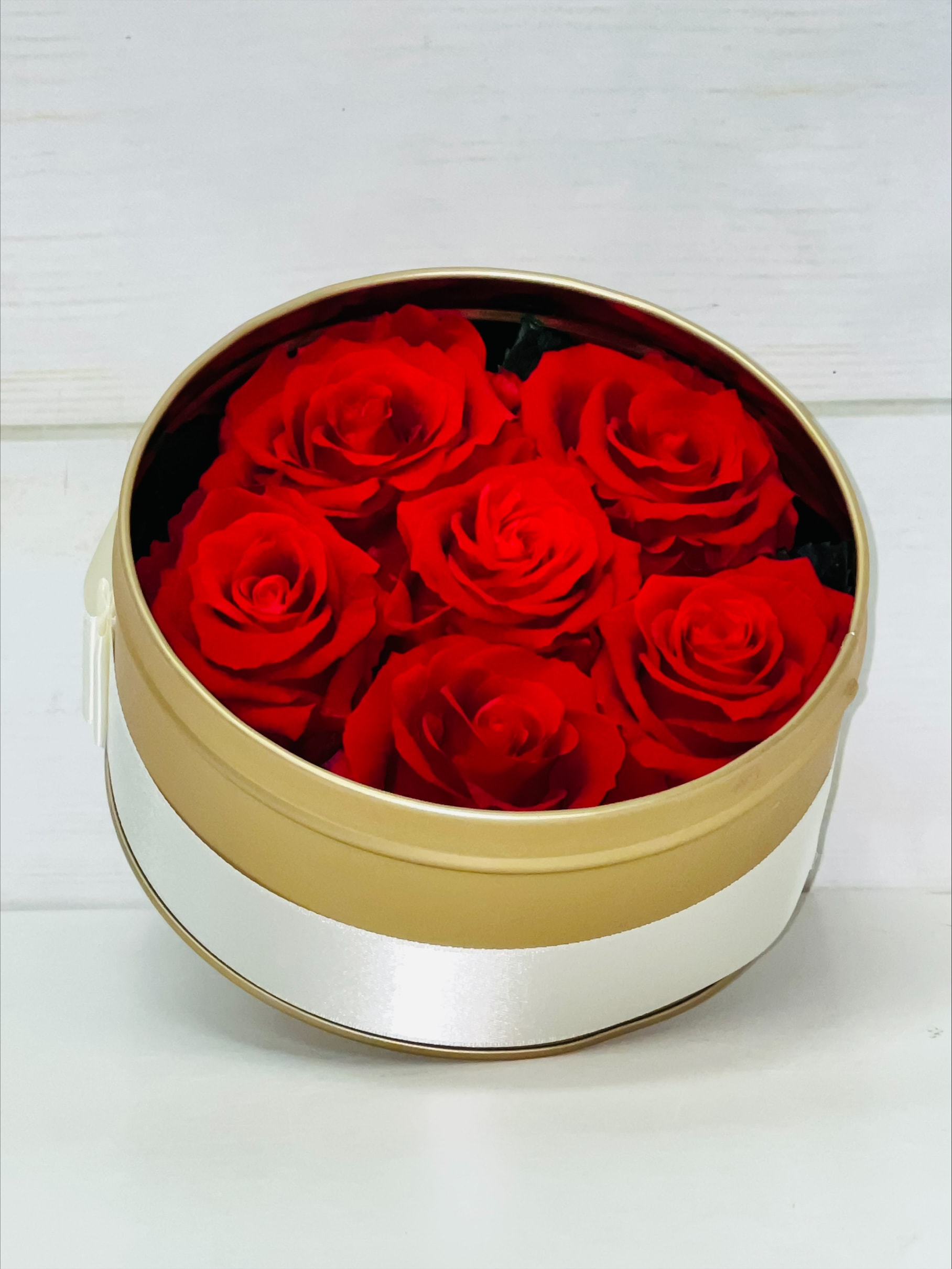 Real Preserved Red Roses in Metal Case (6 Roses) - Enjoy our incredible new Preserved roses! We are working with a company with patented technology to allow you to enjoy this product for up to a year! This one features 6 Red Roses!