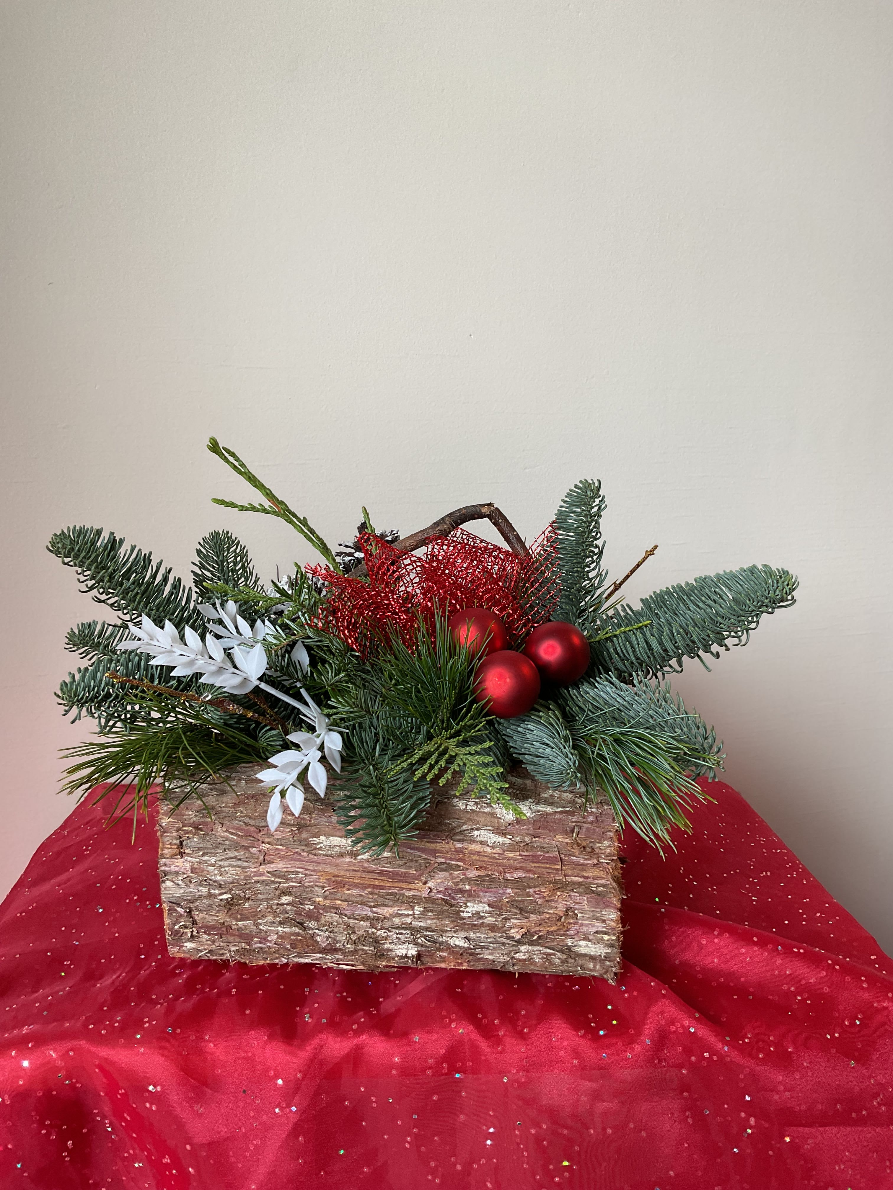 X-mas Cemetery Boxs - We have 3 different sizes cemetery boxes all filled with a mix of Christmas greenery. Beautifully decorated with a Handmade bow, Pinecones, Ornaments, etc.